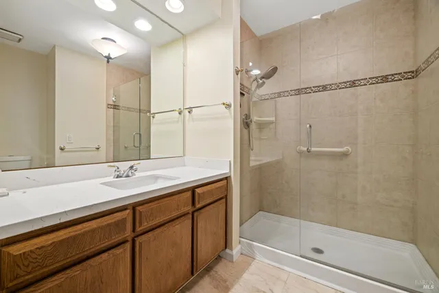 a bathroom with a shower and a bathtub