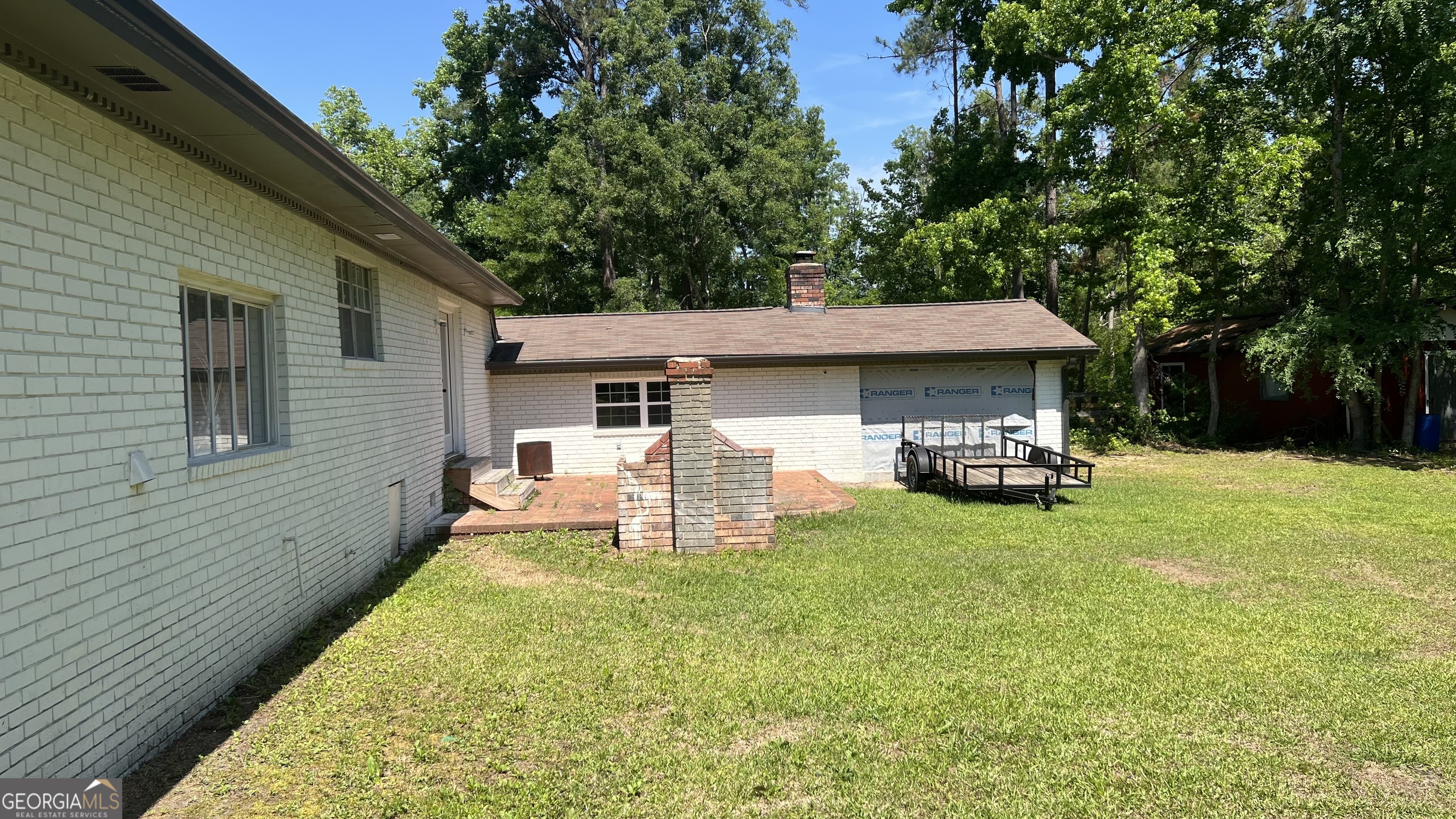 1065 Nathan Jones Road Harlem, GA 30814 - Photo 15 of 32 a view of a house with backyard and sitting area
