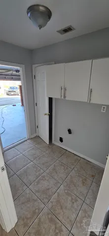 an empty room with an empty space and a window