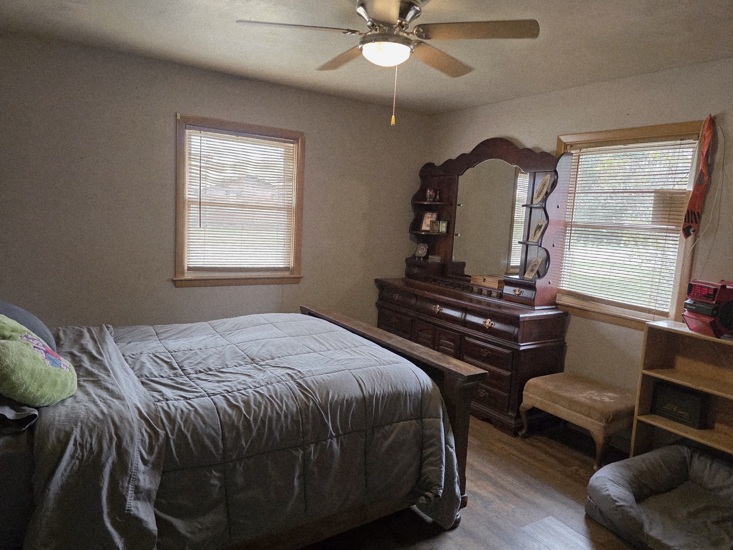 603 1st Street West Lyndon, IL 61261 - Photo 7 of 22 a bedroom with a bed and a dresser
