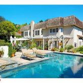 a view of house with yard