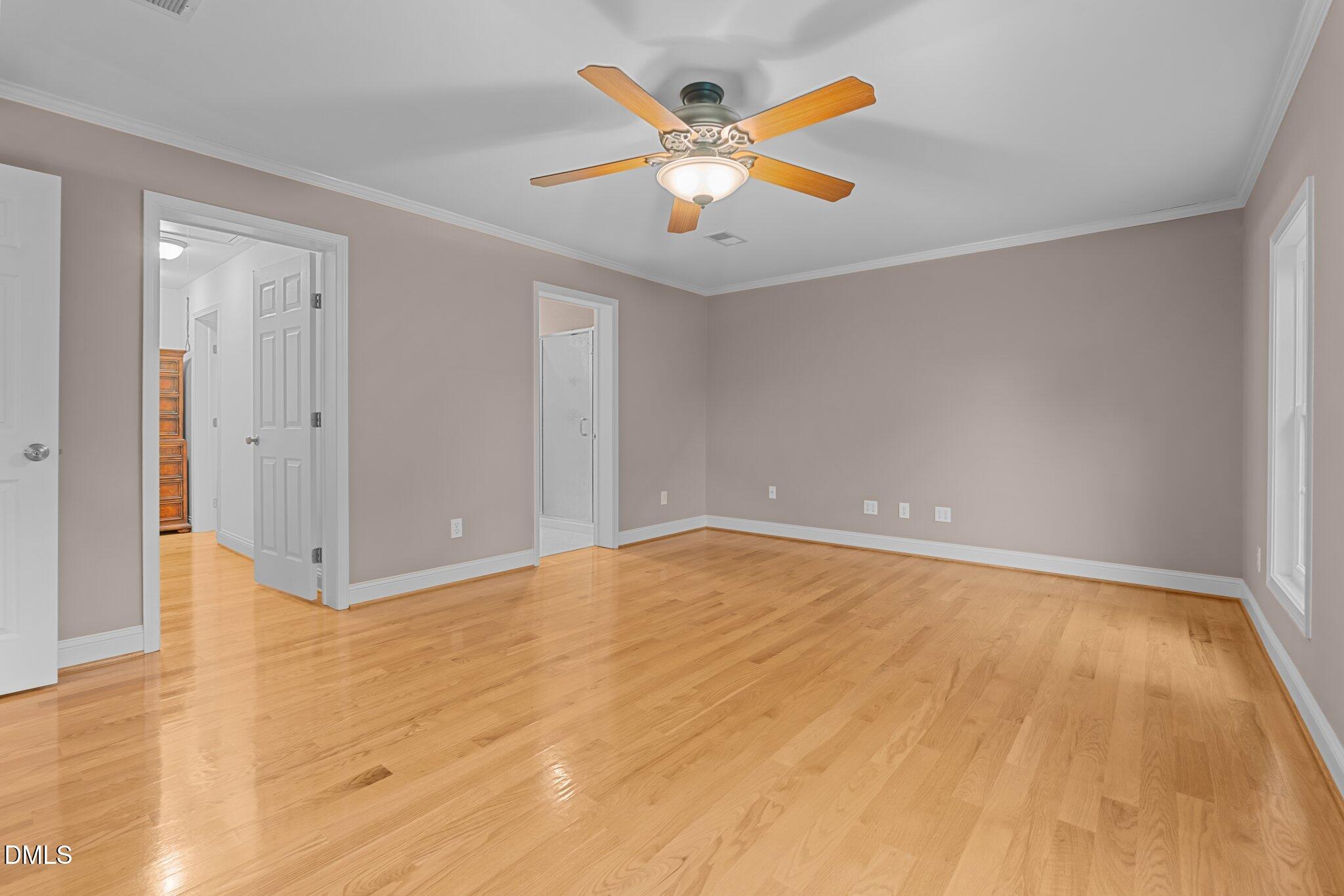 431 Patterson Ridge Lane Sanford, NC 27330 - Photo 17 of 29 an empty room with a ceiling fan and window