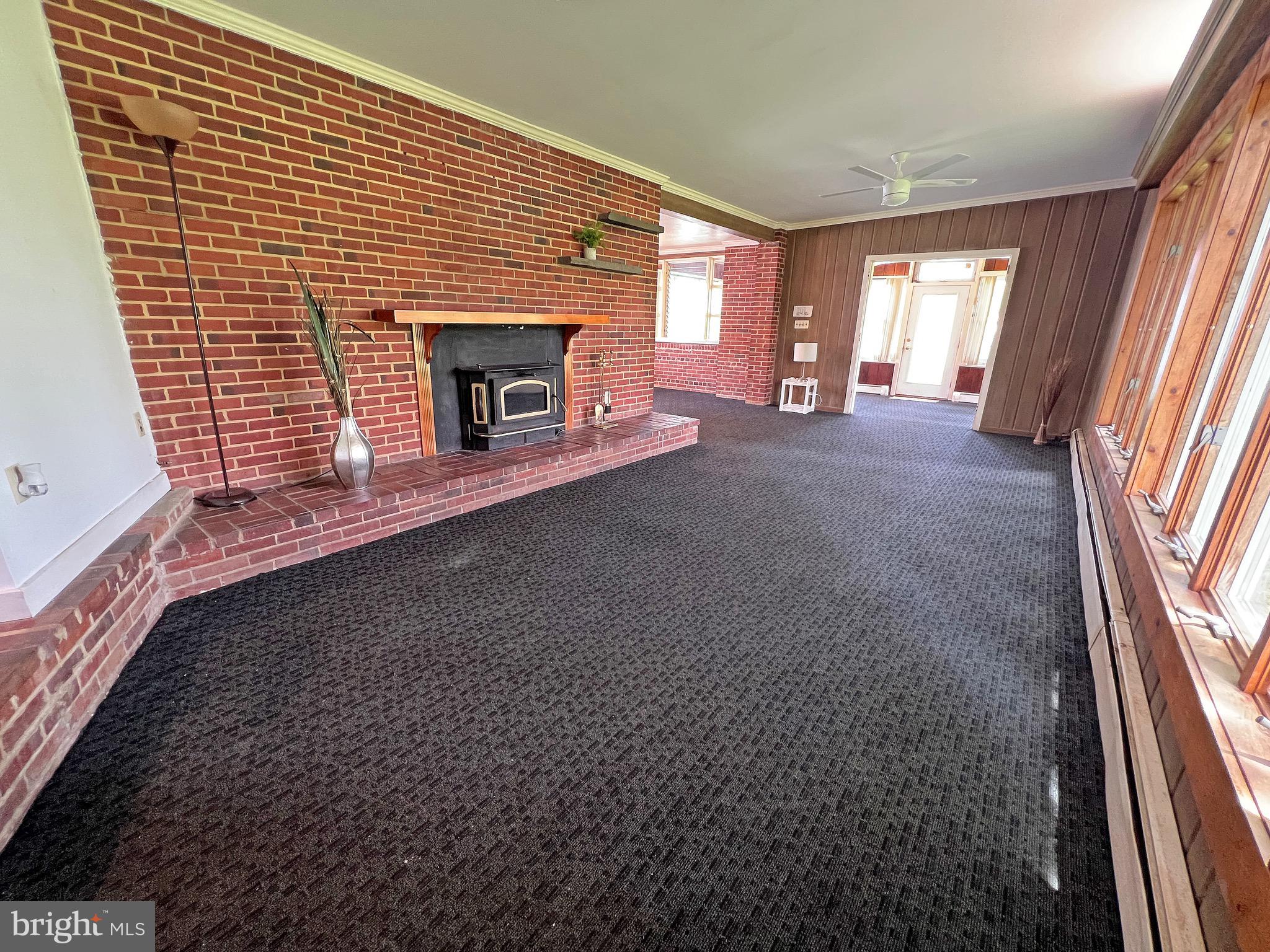 56 Farmdale Road Earleville, MD 21919 - Photo 4 of 56 Living room open to sunroom and dining room