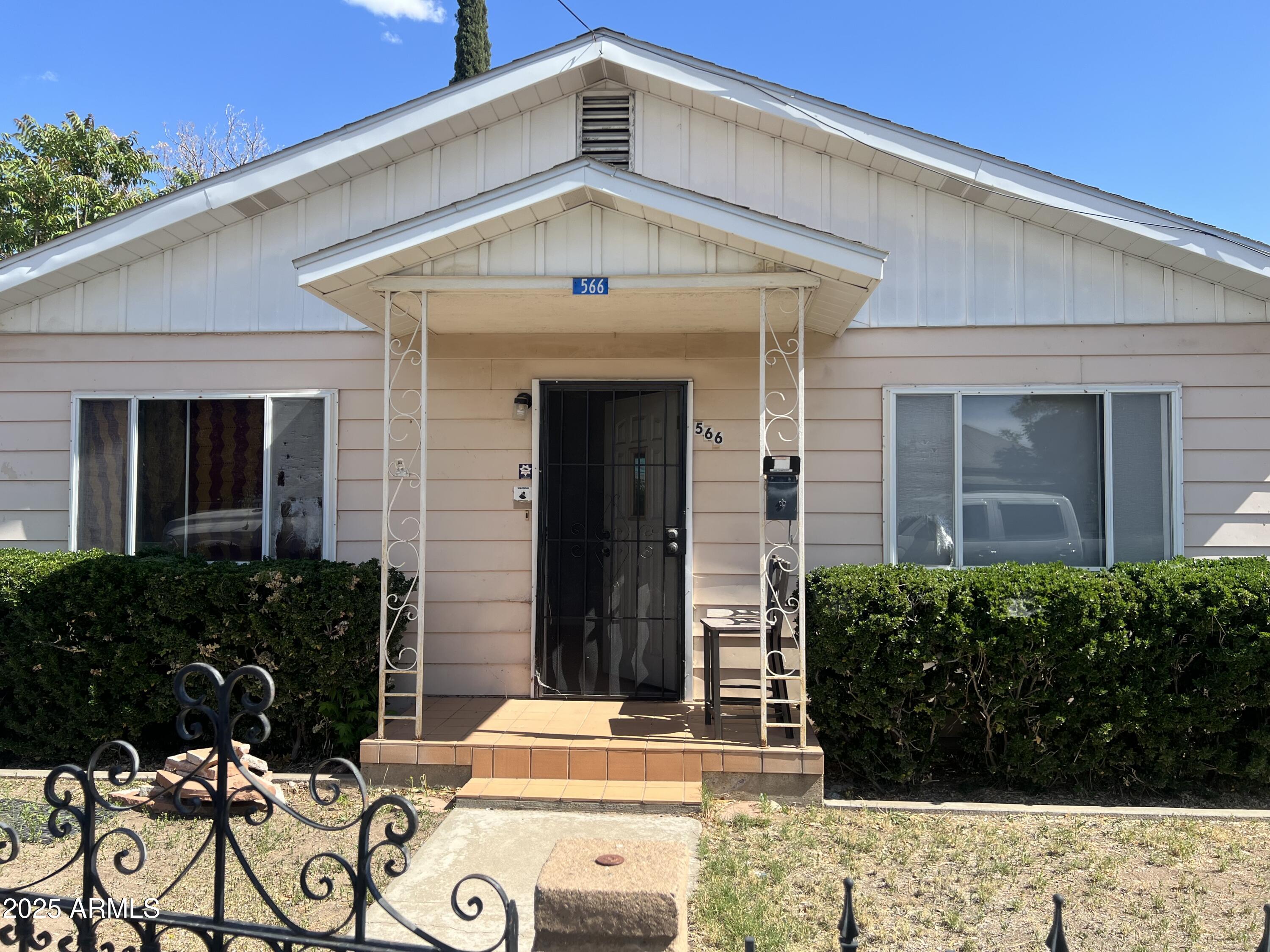 566 Carico Street Globe, AZ 85501 - Photo 1 of 22 front view of a house with a small yard