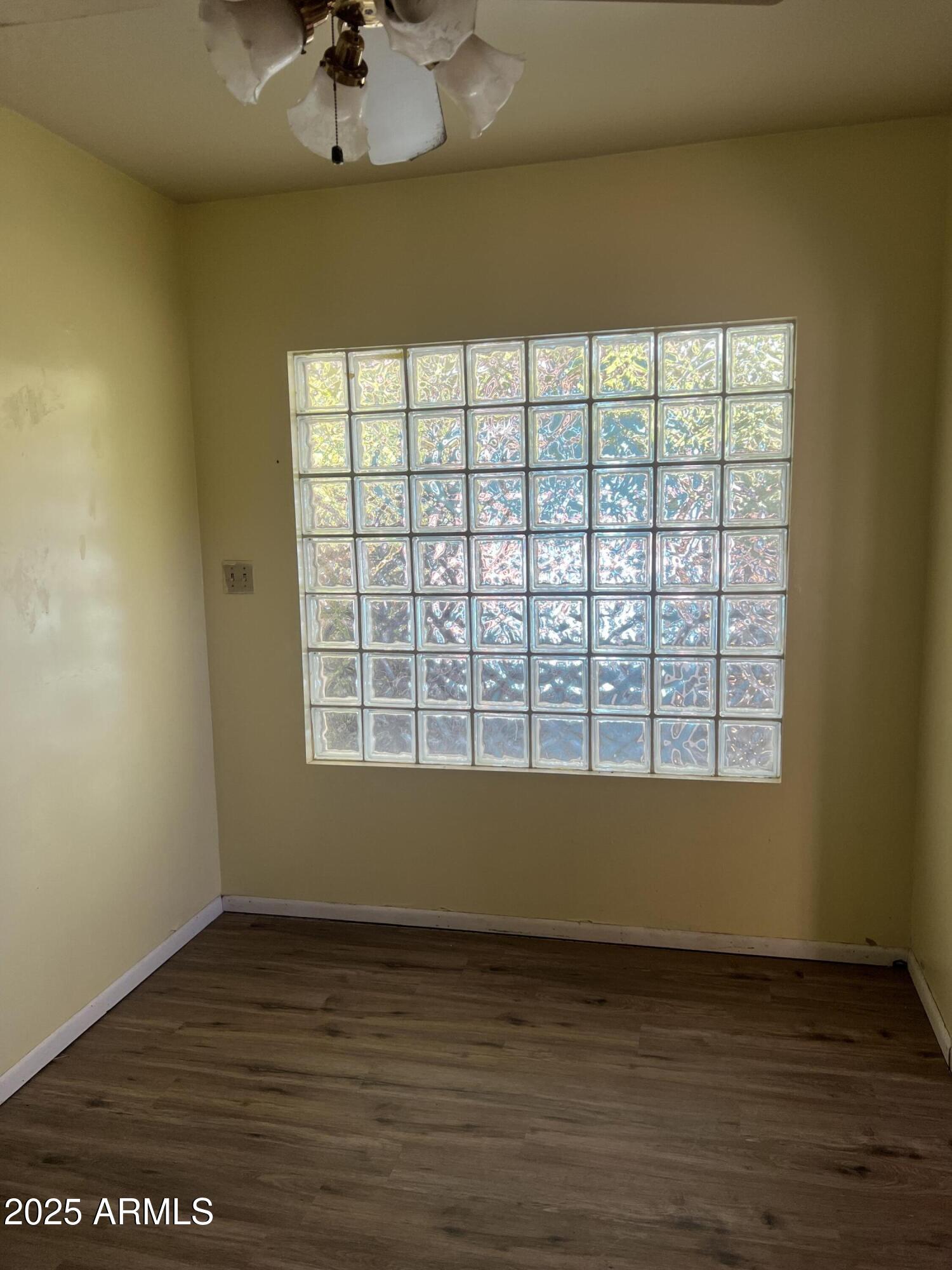 566 Carico Street Globe, AZ 85501 - Photo 11 of 22 a view of an empty room with a window