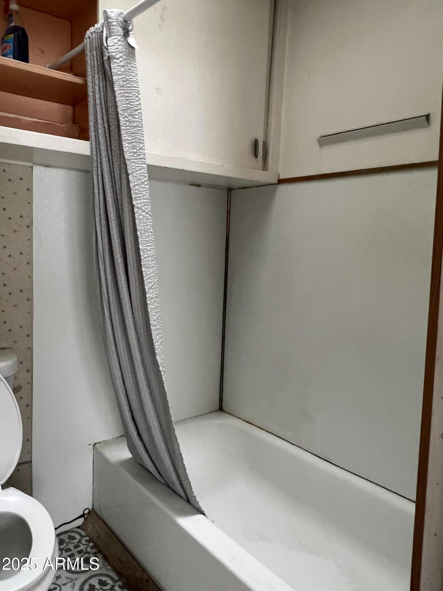 566 Carico Street Globe, AZ 85501 - Photo 17 of 22 a view of an empty walk in closet