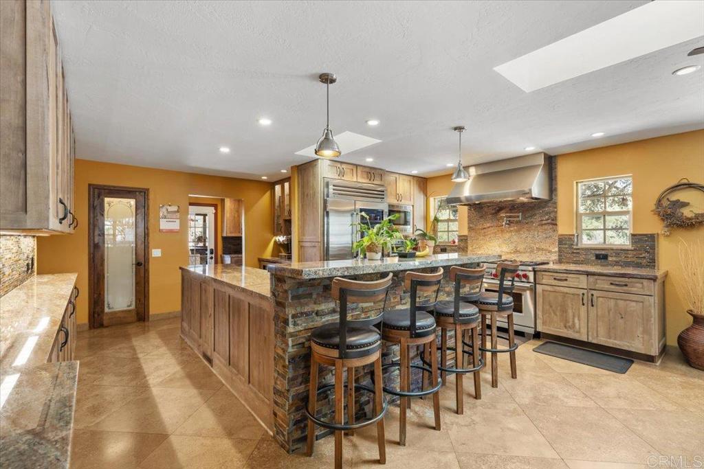10499 Highway 79 Descanso, CA 91916 - Photo 11 of 75 a kitchen with lots of wooden furniture cabinets and furniture