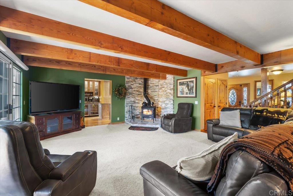 10499 Highway 79 Descanso, CA 91916 - Photo 24 of 75 a bedroom with furniture and a large window