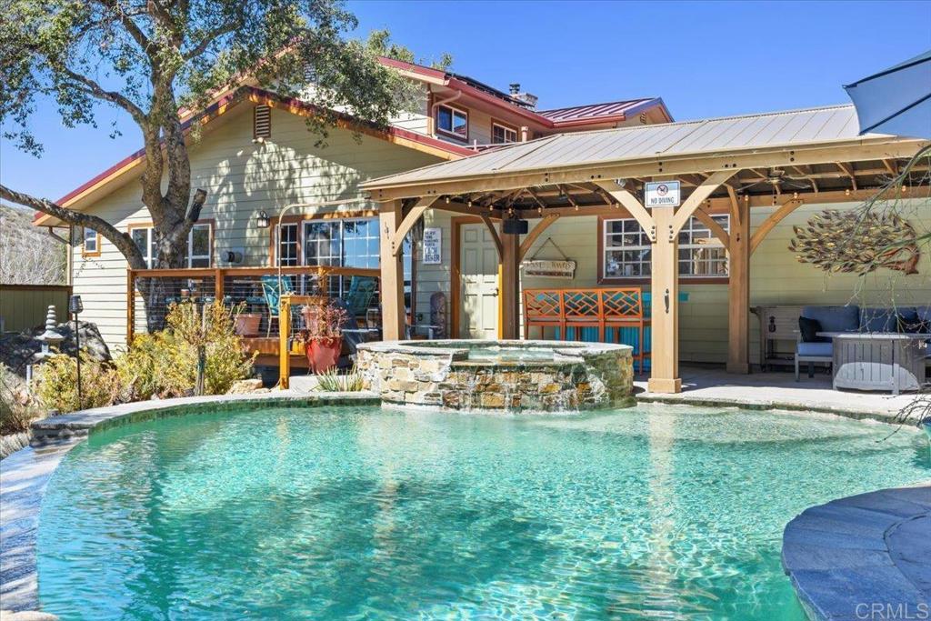 10499 Highway 79 Descanso, CA 91916 - Photo 35 of 75 a view of a house with a yard