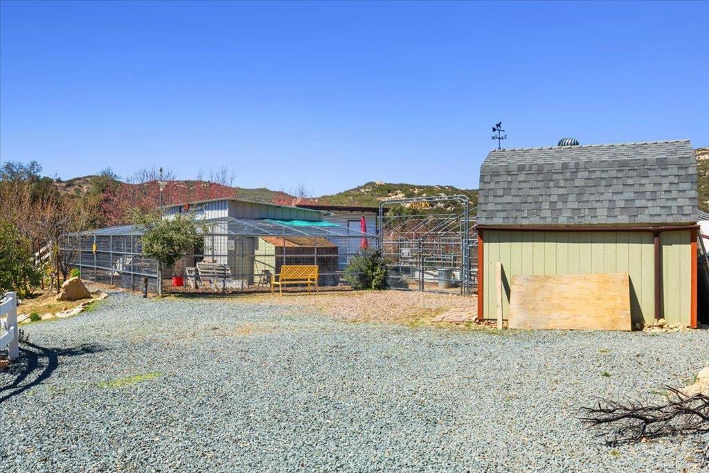 10499 Highway 79 Descanso, CA 91916 - Photo 52 of 75 a view of a house with a outdoor space