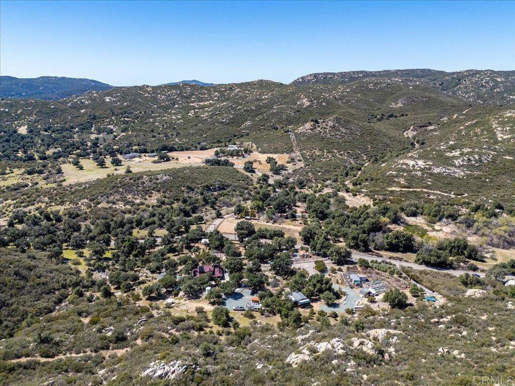10499 Highway 79 Descanso, CA 91916 - Photo 69 of 75 an aerial view of residential houses with outdoor space and mountain view