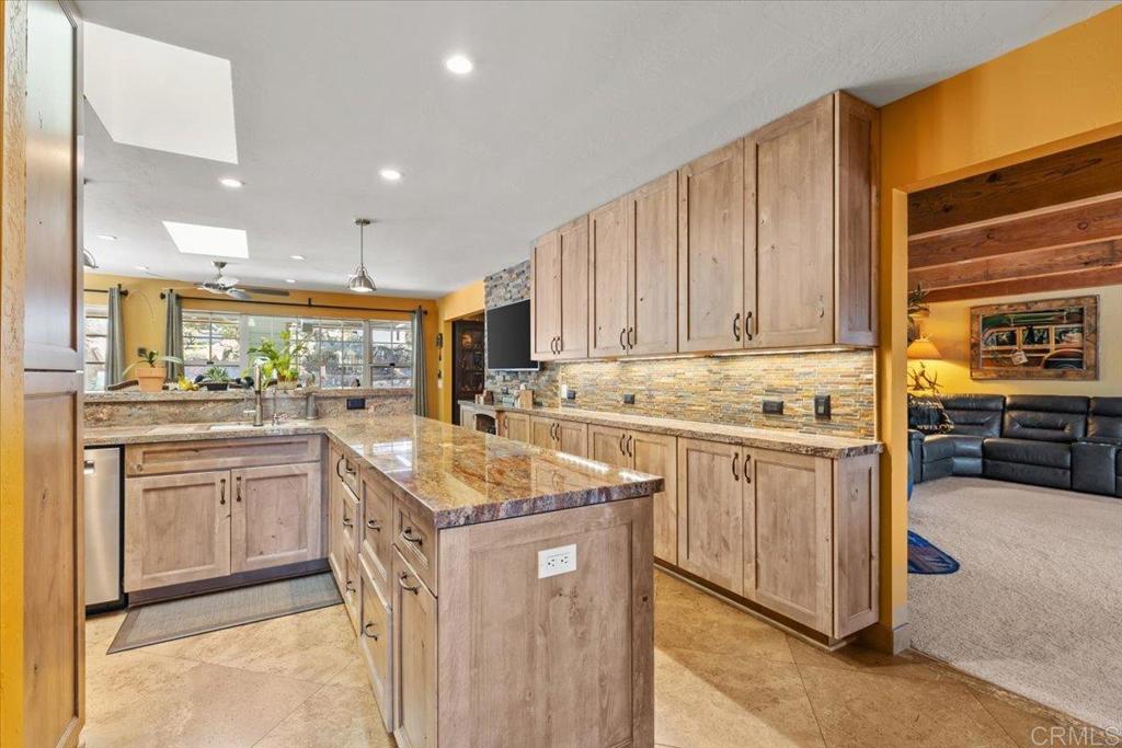 10499 Highway 79 Descanso, CA 91916 - Photo 9 of 75 a kitchen with stainless steel appliances granite countertop a sink stove and cabinets