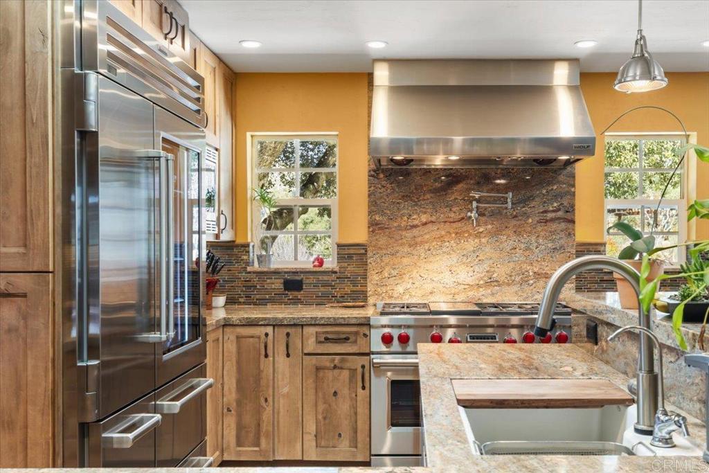 10499 Highway 79 Descanso, CA 91916 - Photo 10 of 75 a kitchen with stainless steel appliances granite countertop a sink stove and refrigerator