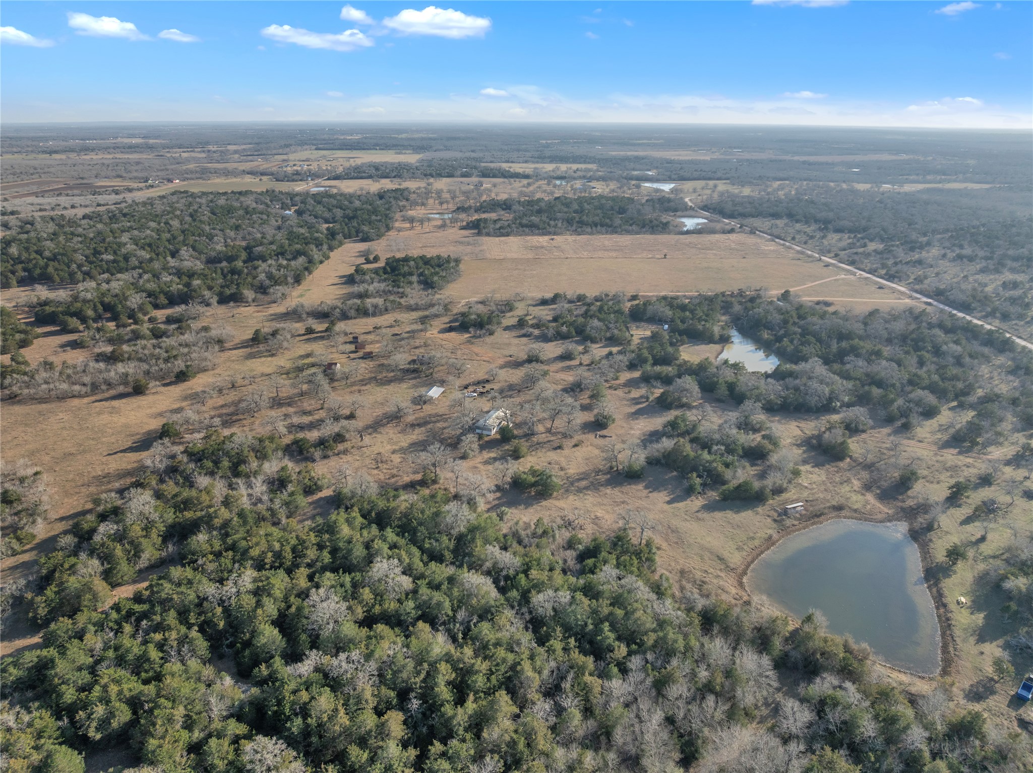 895 Patterson Road Flatonia, TX 78941 - Photo 11 of 21 View of rural area featuring a large body of water