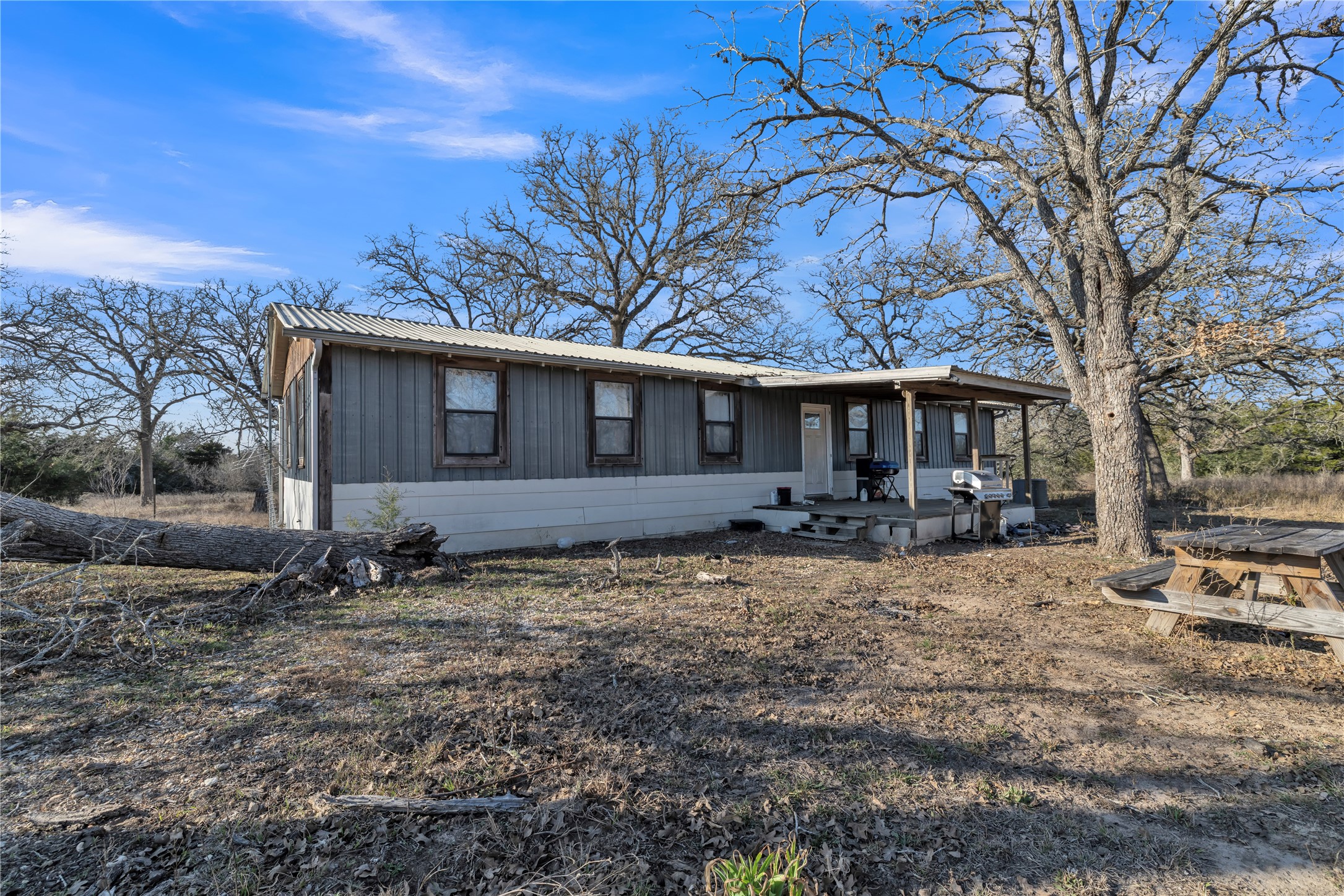 895 Patterson Road Flatonia, TX 78941 - Photo 2 of 21 View of front of property with a metal roof
