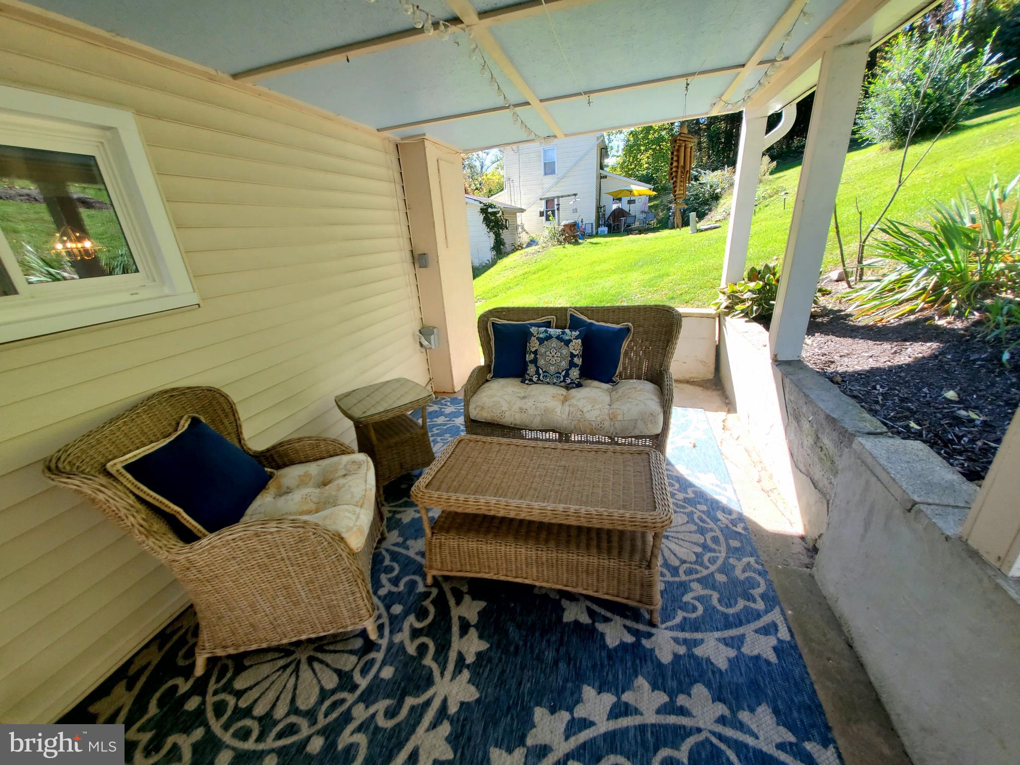311 Lyonstown Road Bellefonte, PA 16823 - Photo 11 of 43 a outdoor living space with furniture and garden view