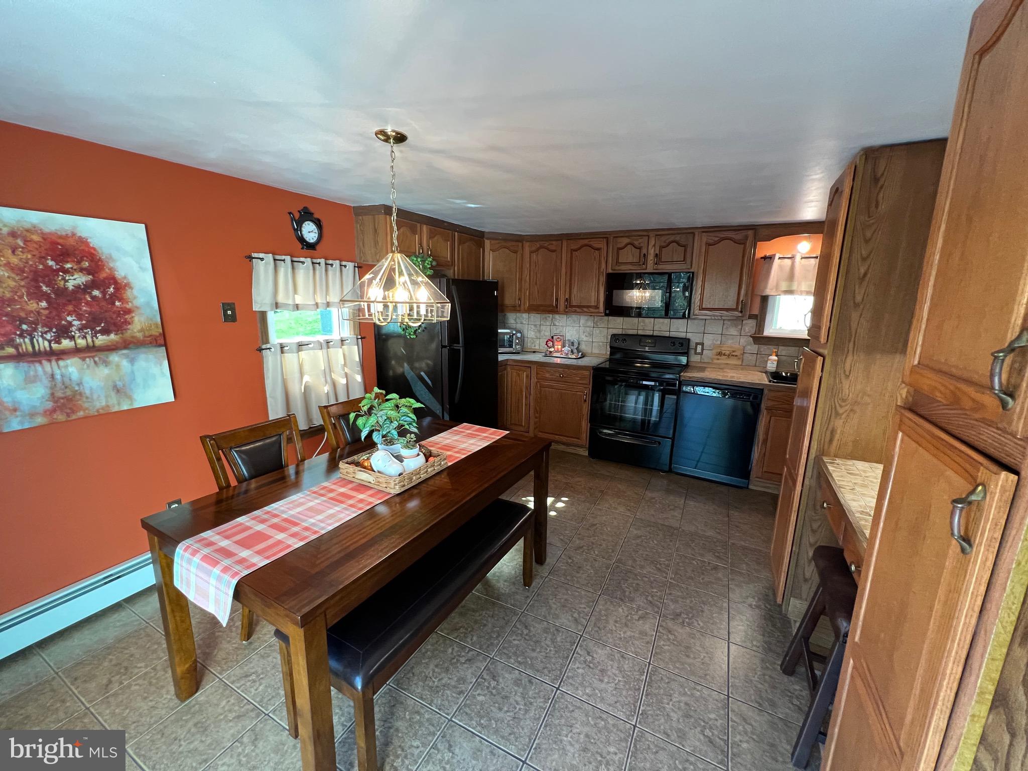 311 Lyonstown Road Bellefonte, PA 16823 - Photo 25 of 43 a living room with furniture and a flat screen tv