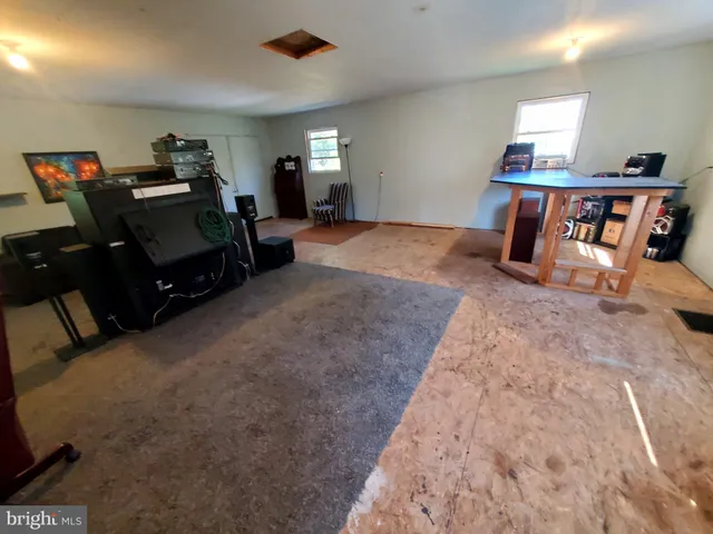 a bed room with a bed and a fish tank