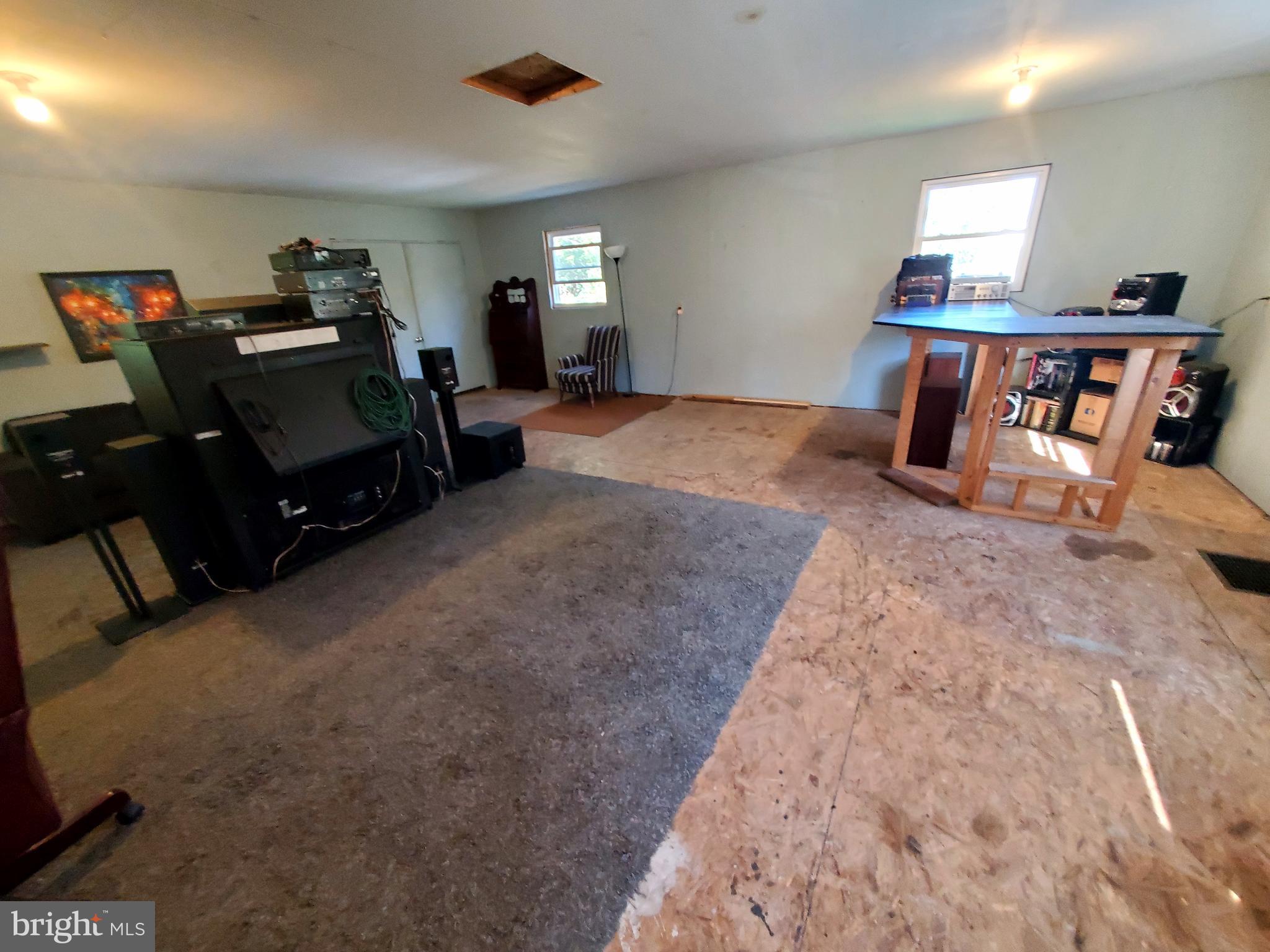 311 Lyonstown Road Bellefonte, PA 16823 - Photo 40 of 43 a bed room with a bed and a fish tank