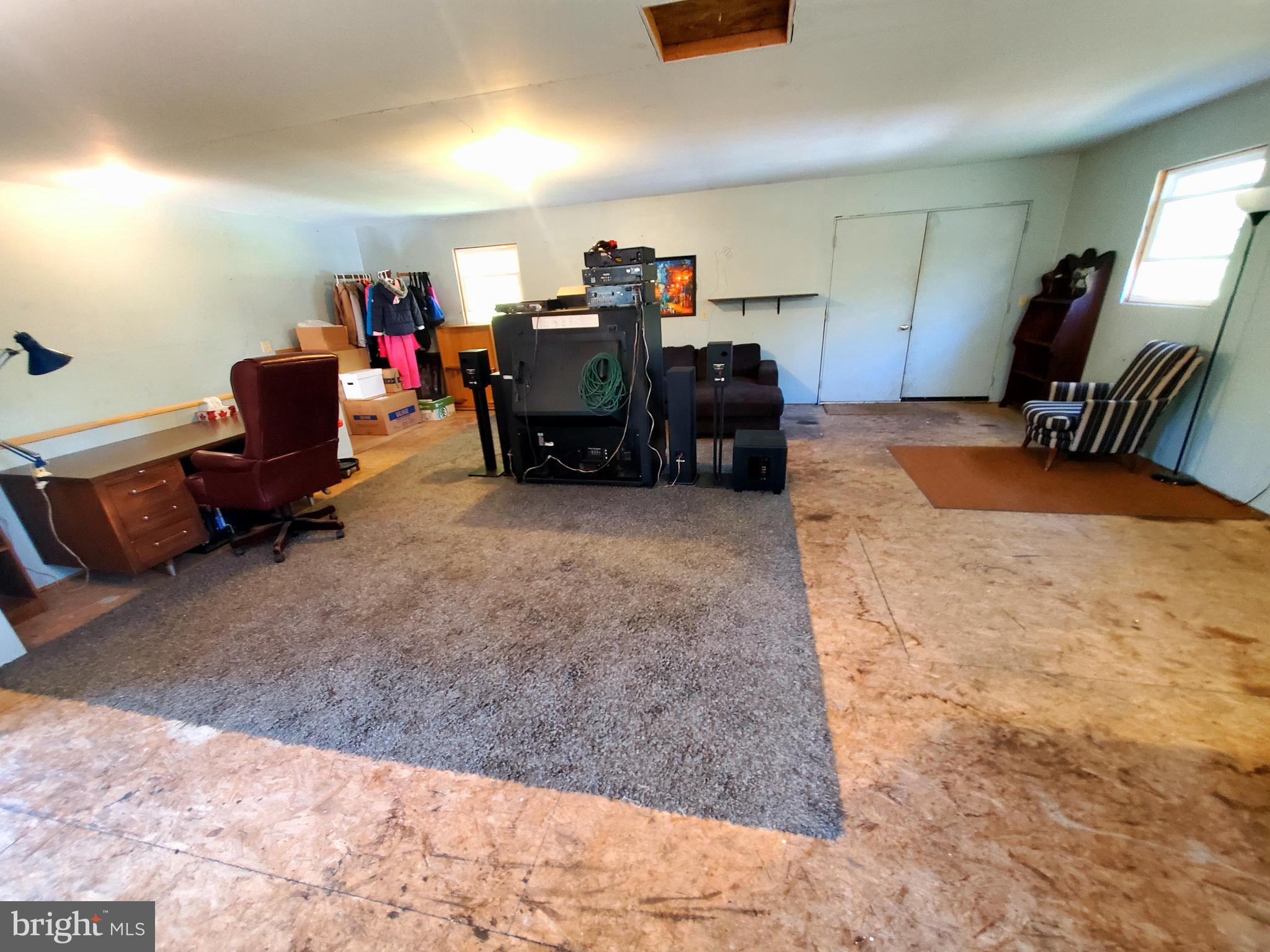 311 Lyonstown Road Bellefonte, PA 16823 - Photo 42 of 43 a bed room with a bed and a television