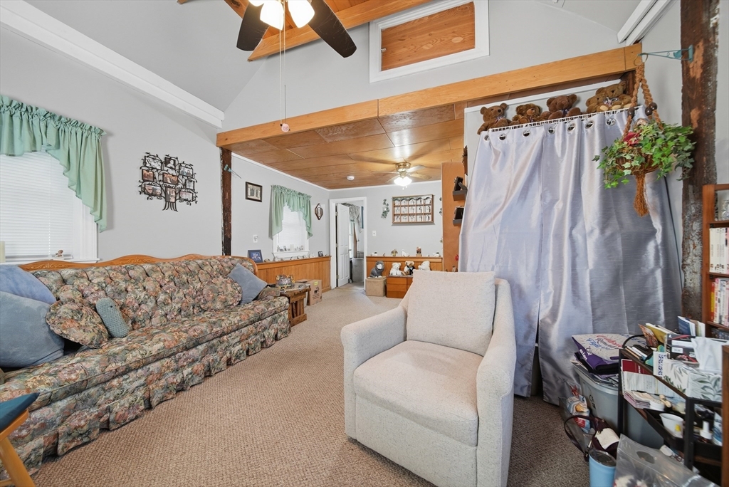 436 Franklin Road Fitchburg, MA 01420 - Photo 18 of 41 a living room with furniture and a large window