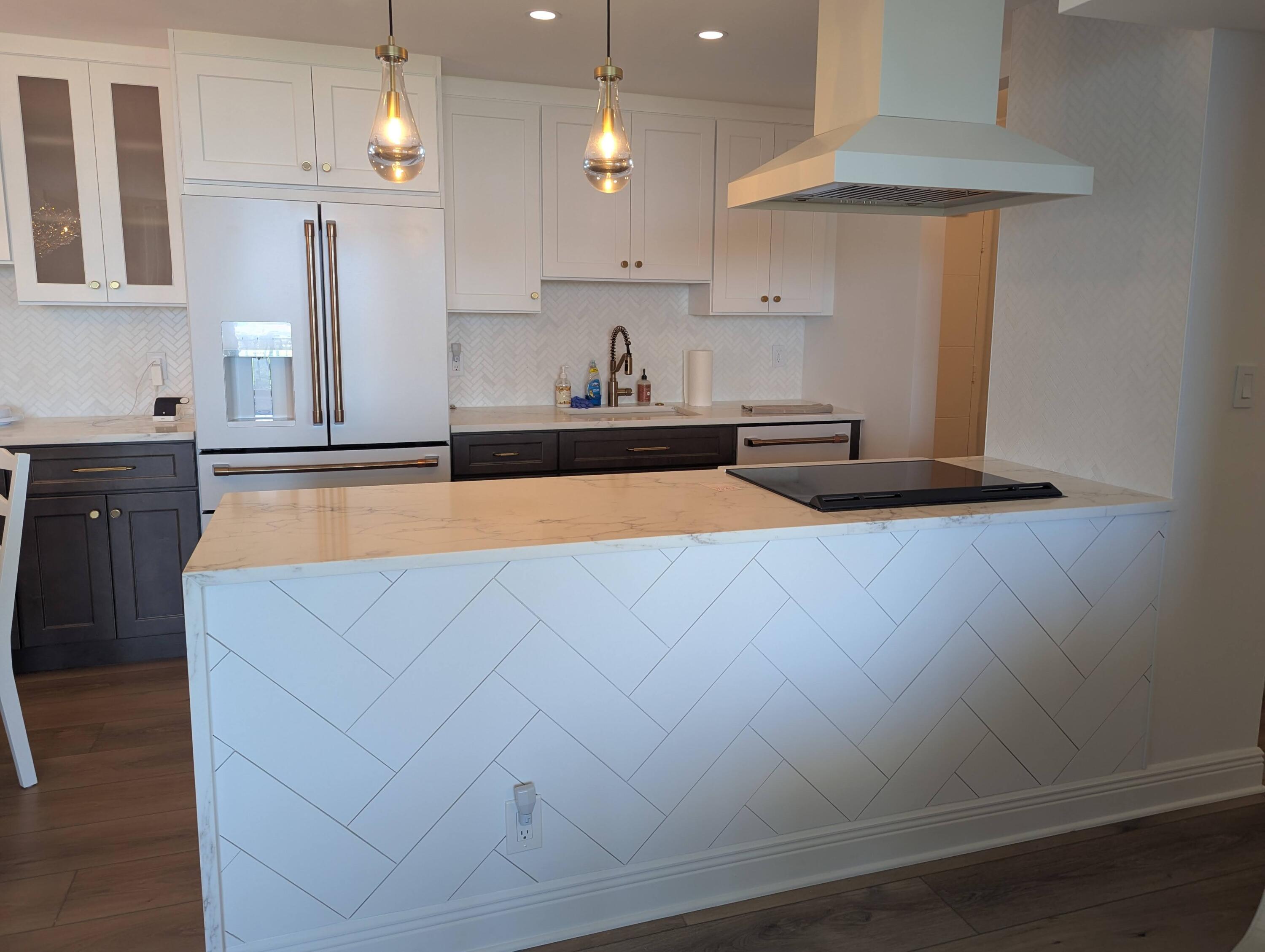 2121 North Ocean Boulevard, Unit 1006E Boca Raton, FL 33431 - Photo 31 of 64 a kitchen with granite countertop a sink a stove and a refrigerator