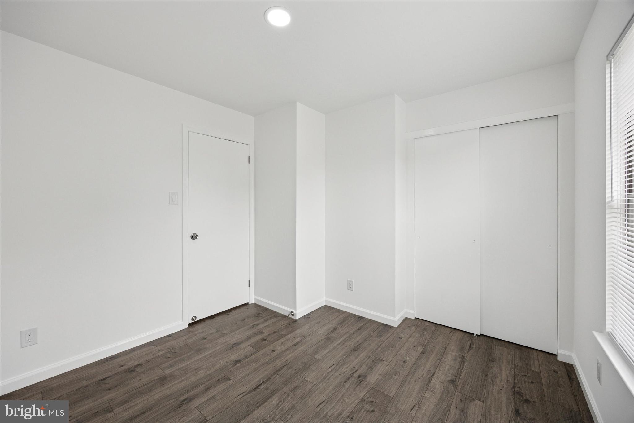 532 Cormorant Drive Voorhees, NJ 08043 - Photo 18 of 25 a view of an empty room with wooden floor