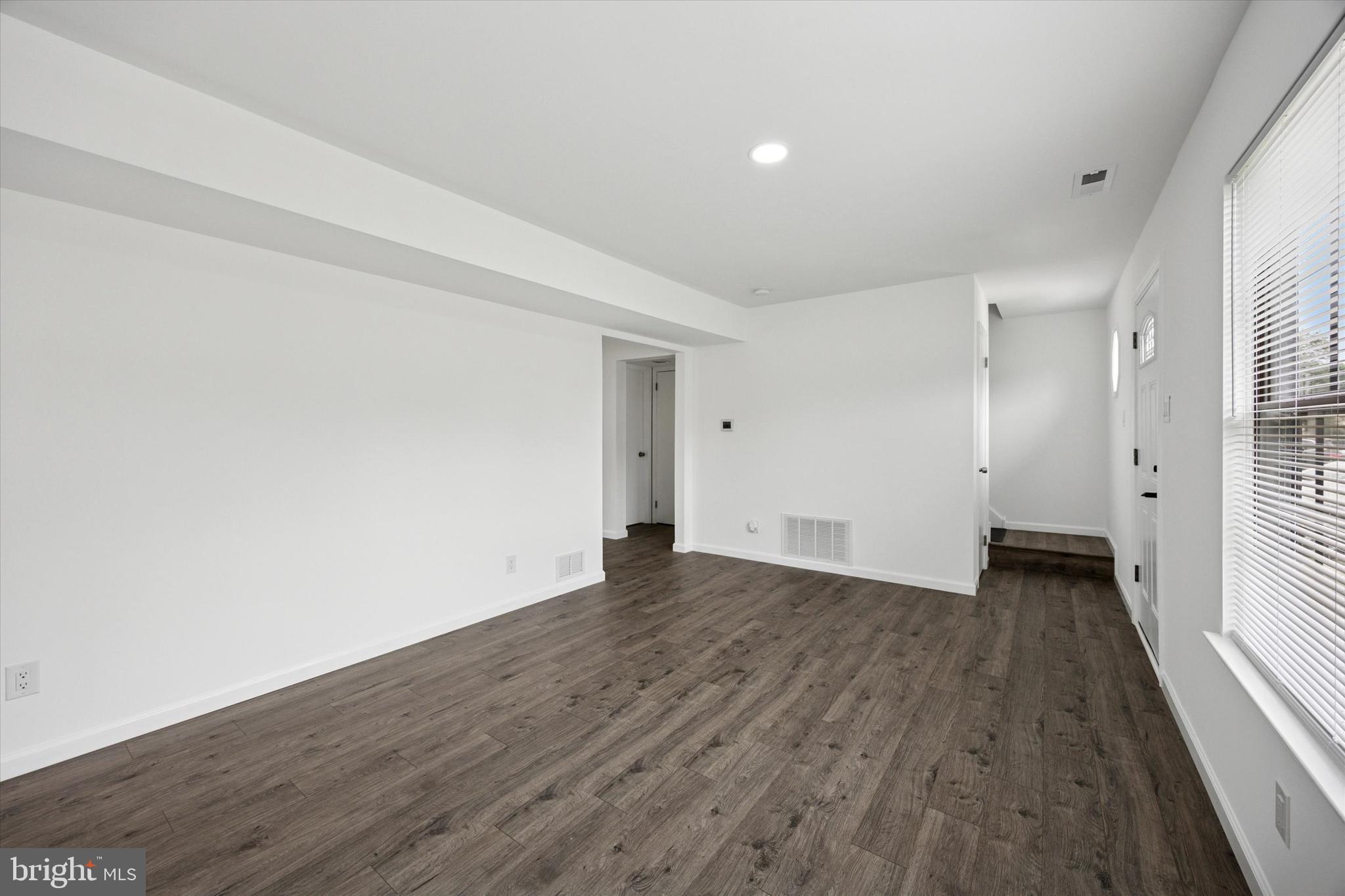 532 Cormorant Drive Voorhees, NJ 08043 - Photo 6 of 25 a view of an empty room and wooden floor