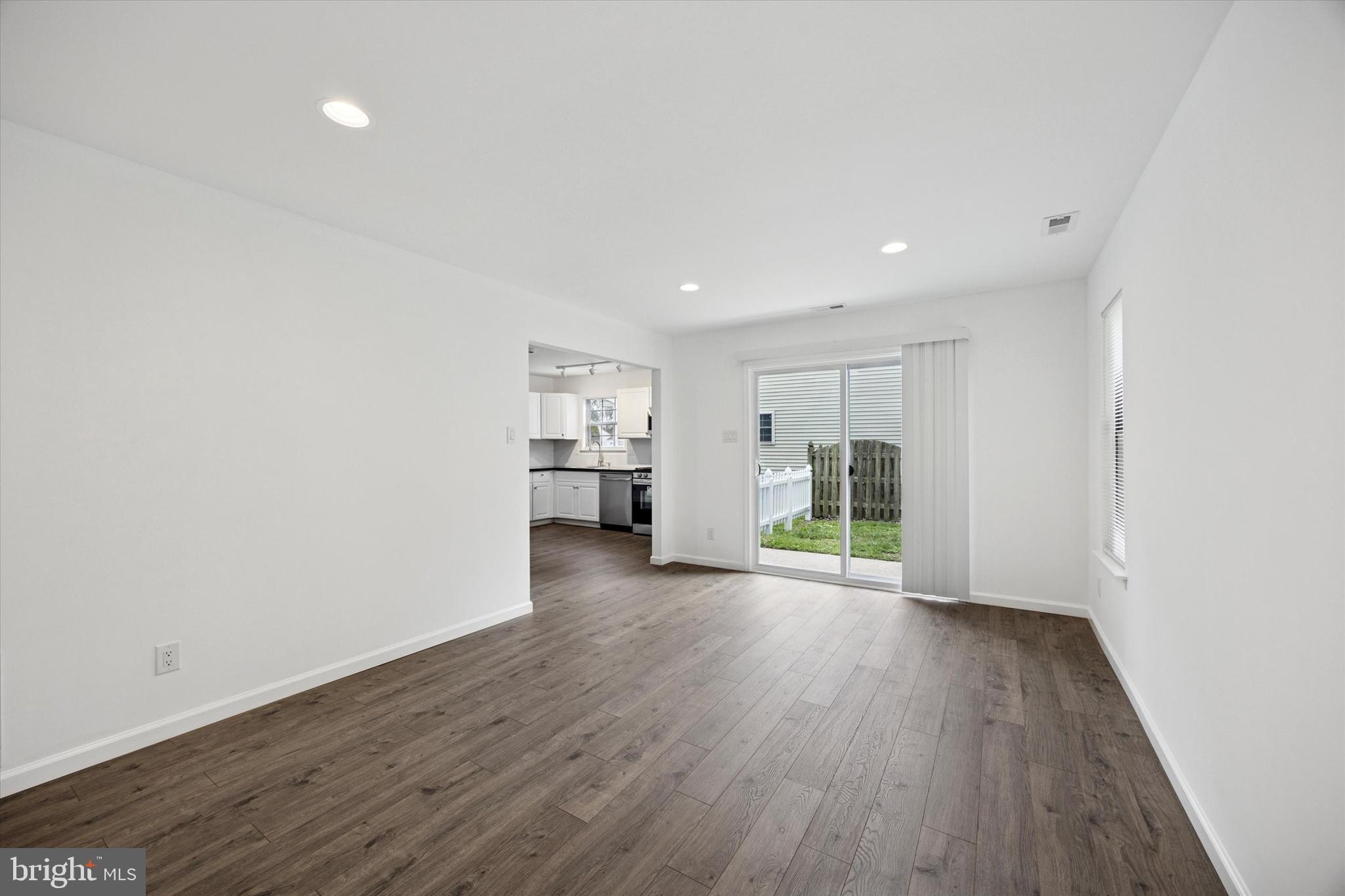 532 Cormorant Drive Voorhees, NJ 08043 - Photo 7 of 25 an empty room with wooden floor and a window