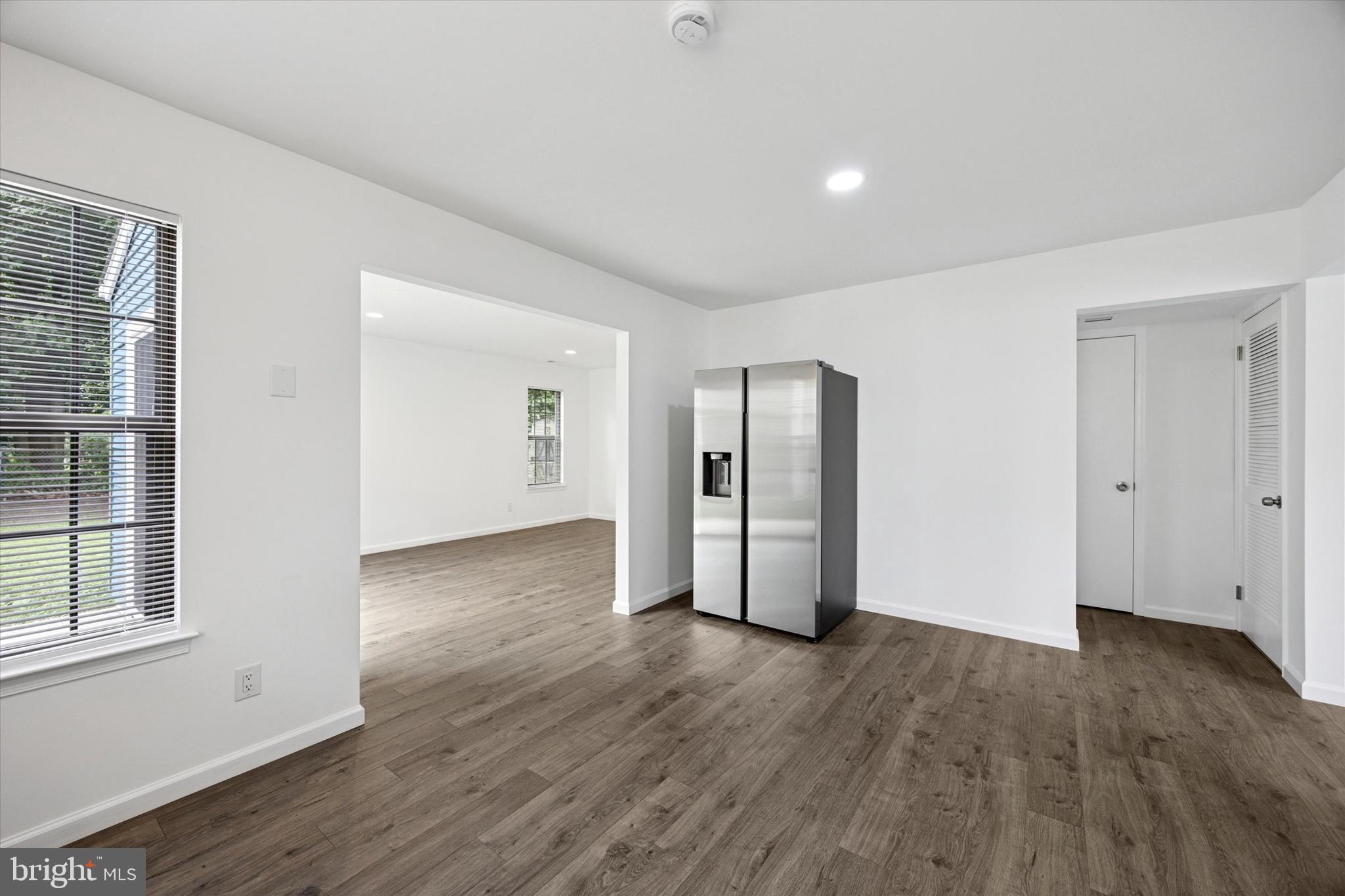 532 Cormorant Drive Voorhees, NJ 08043 - Photo 9 of 25 a view of empty room with wooden floor and window