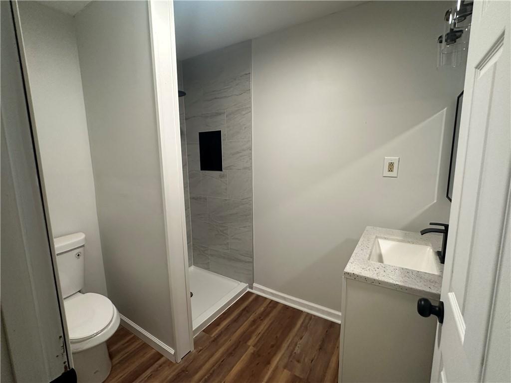 201 Clever Road McKees Rocks, PA 15136 - Photo 13 of 30 a bathroom with a toilet and a shower