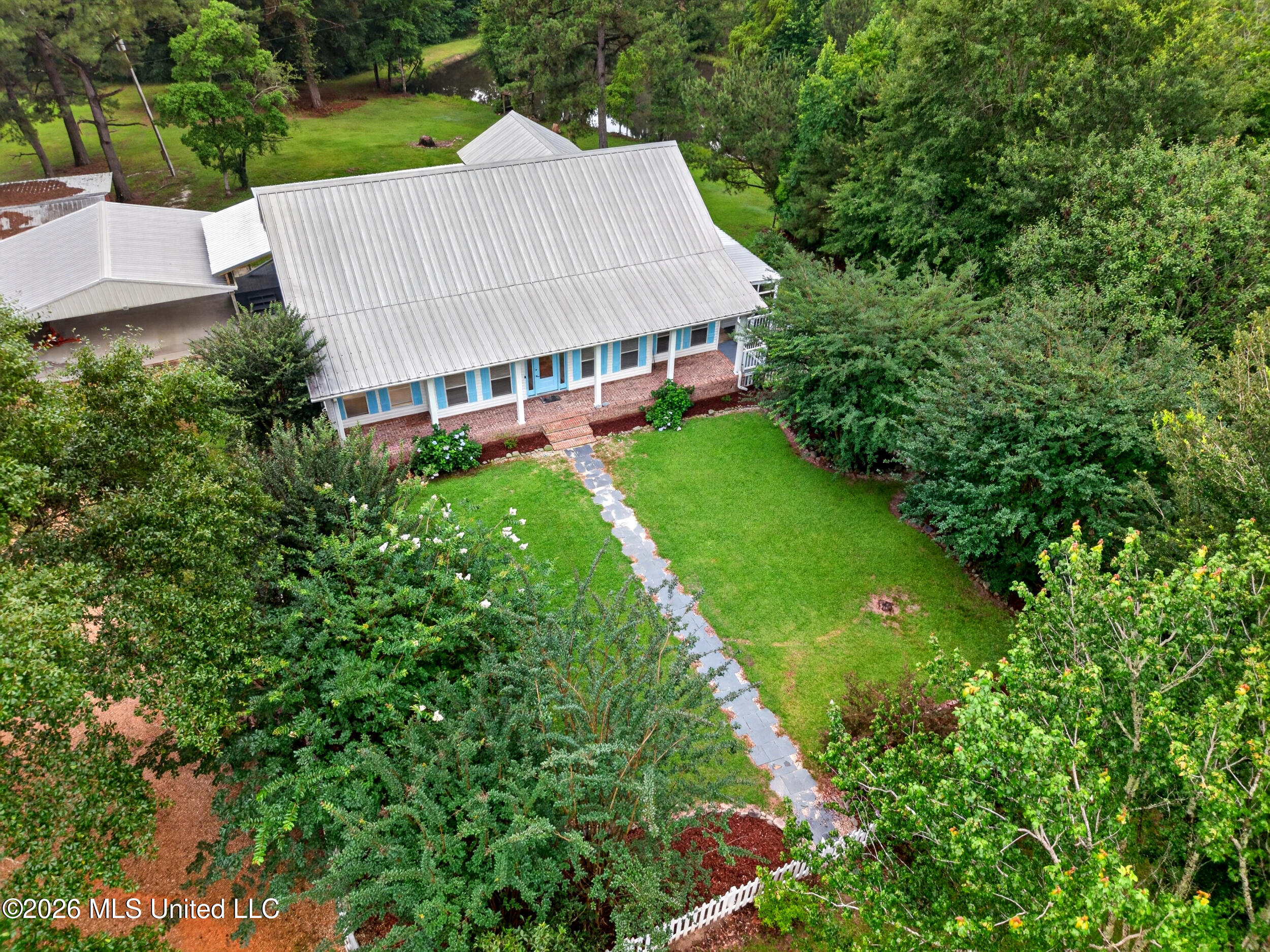 219 Pop Hill Road, Unit B Poplarville, MS 39470 - Photo 9 of 74 9_09_aerialfront