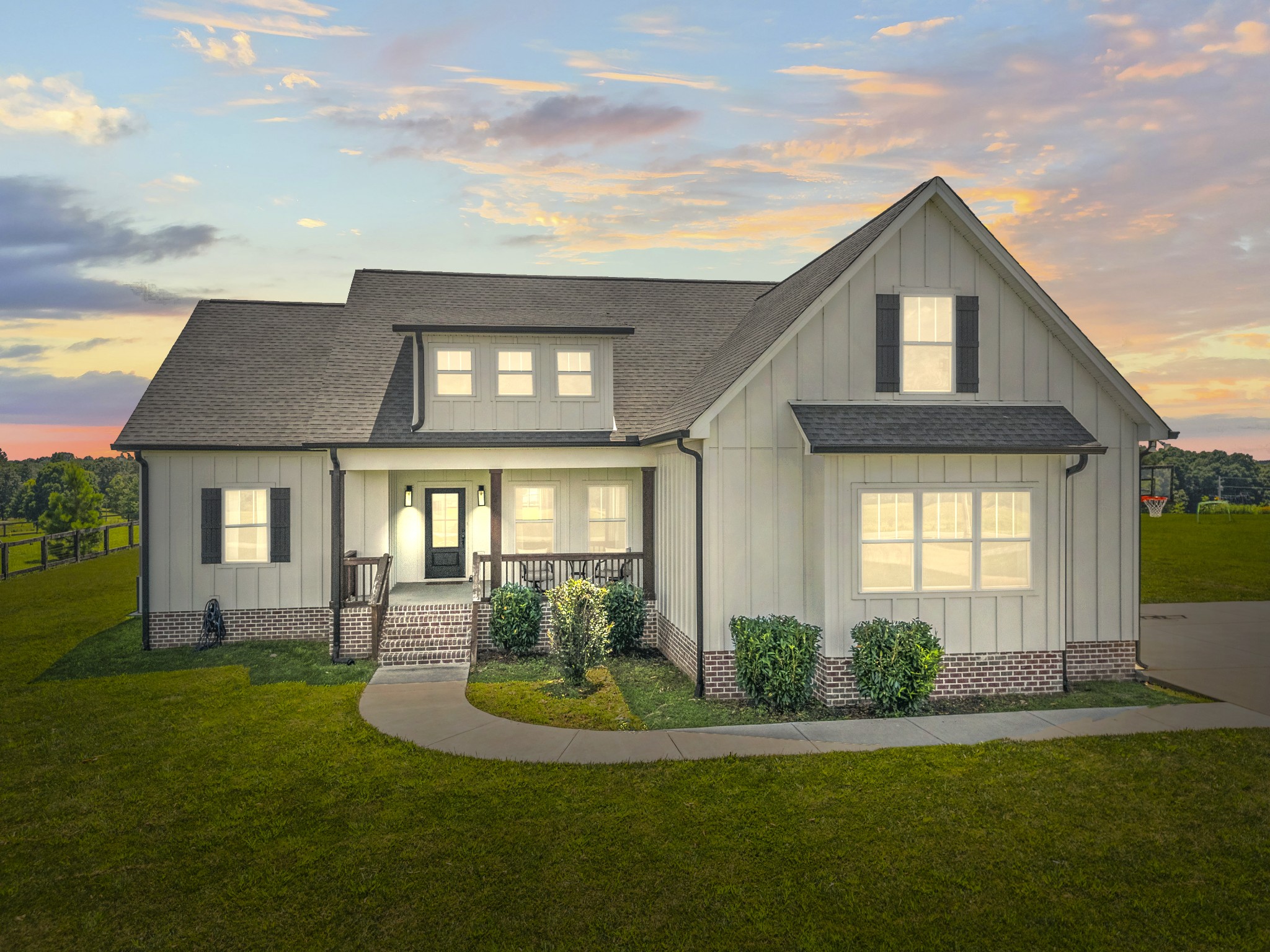 1406 Fowler Ford Road Portland, TN 37148 - Photo 1 of 54 a front view of a house with a yard