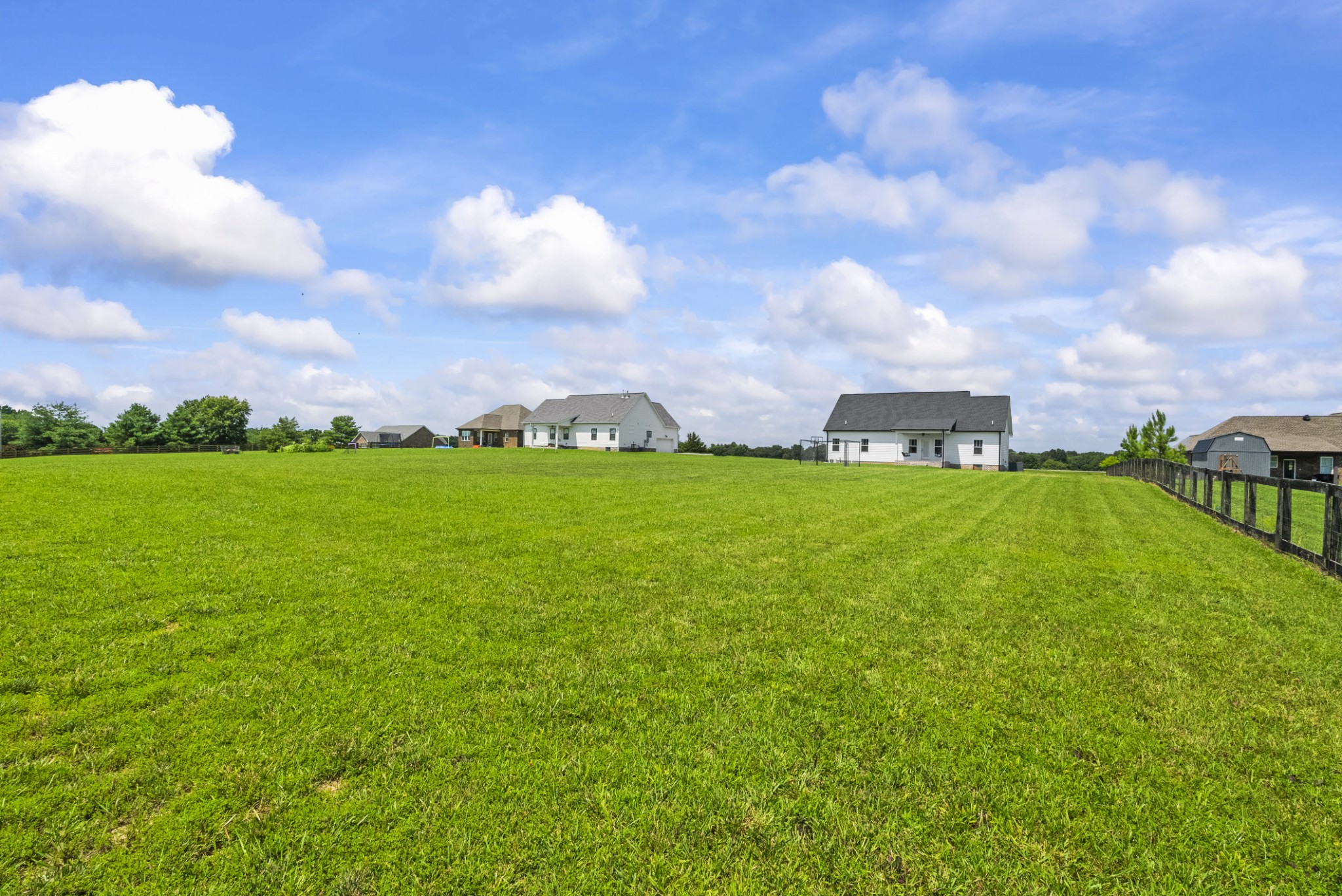 1406 Fowler Ford Road Portland, TN 37148 - Photo 50 of 54 a view of a big yard with a house in the background