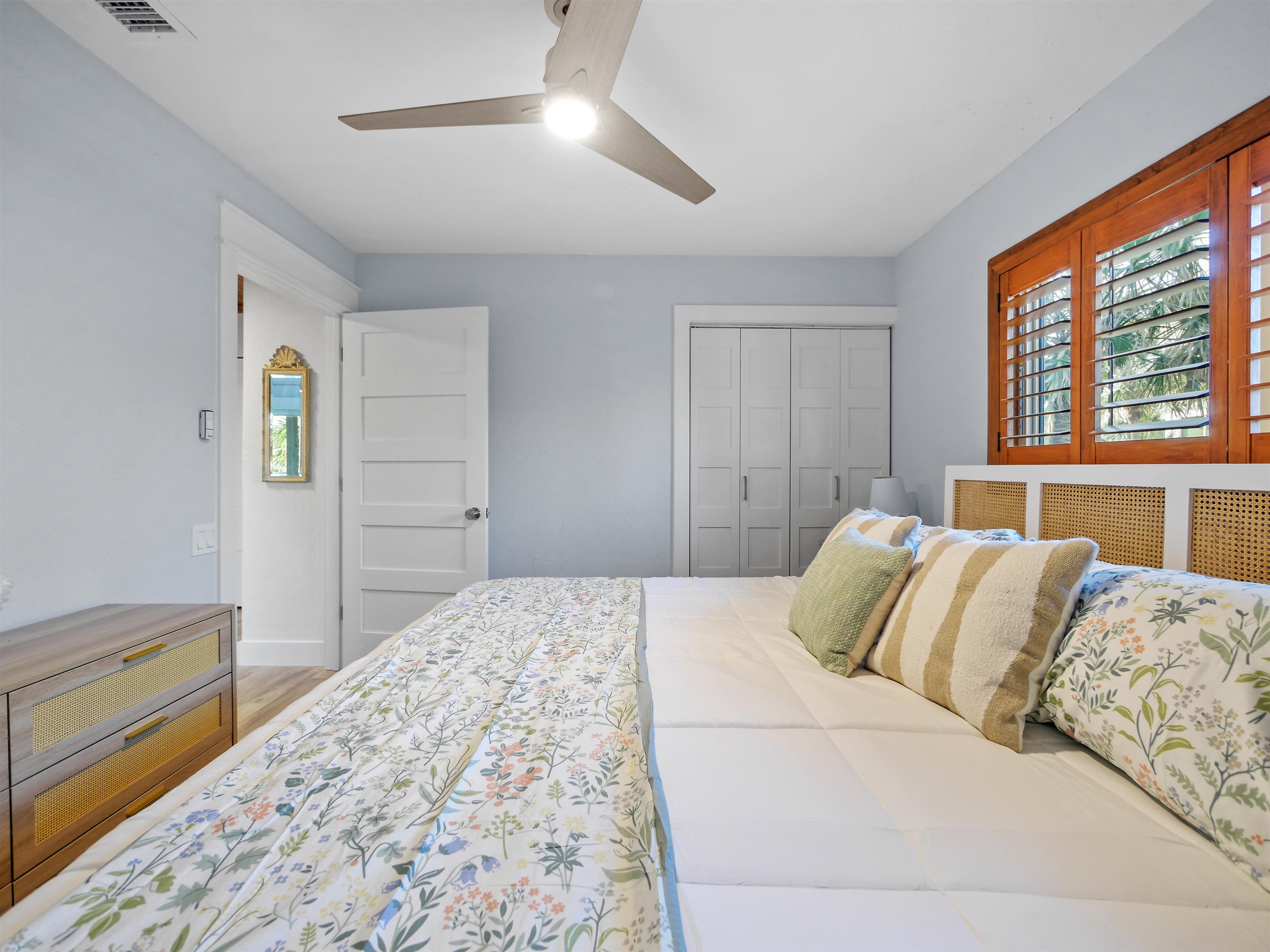 5372 Atlantic View St. Augustine, FL 32080 - Photo 12 of 56 a bedroom with a large bed and a dresser