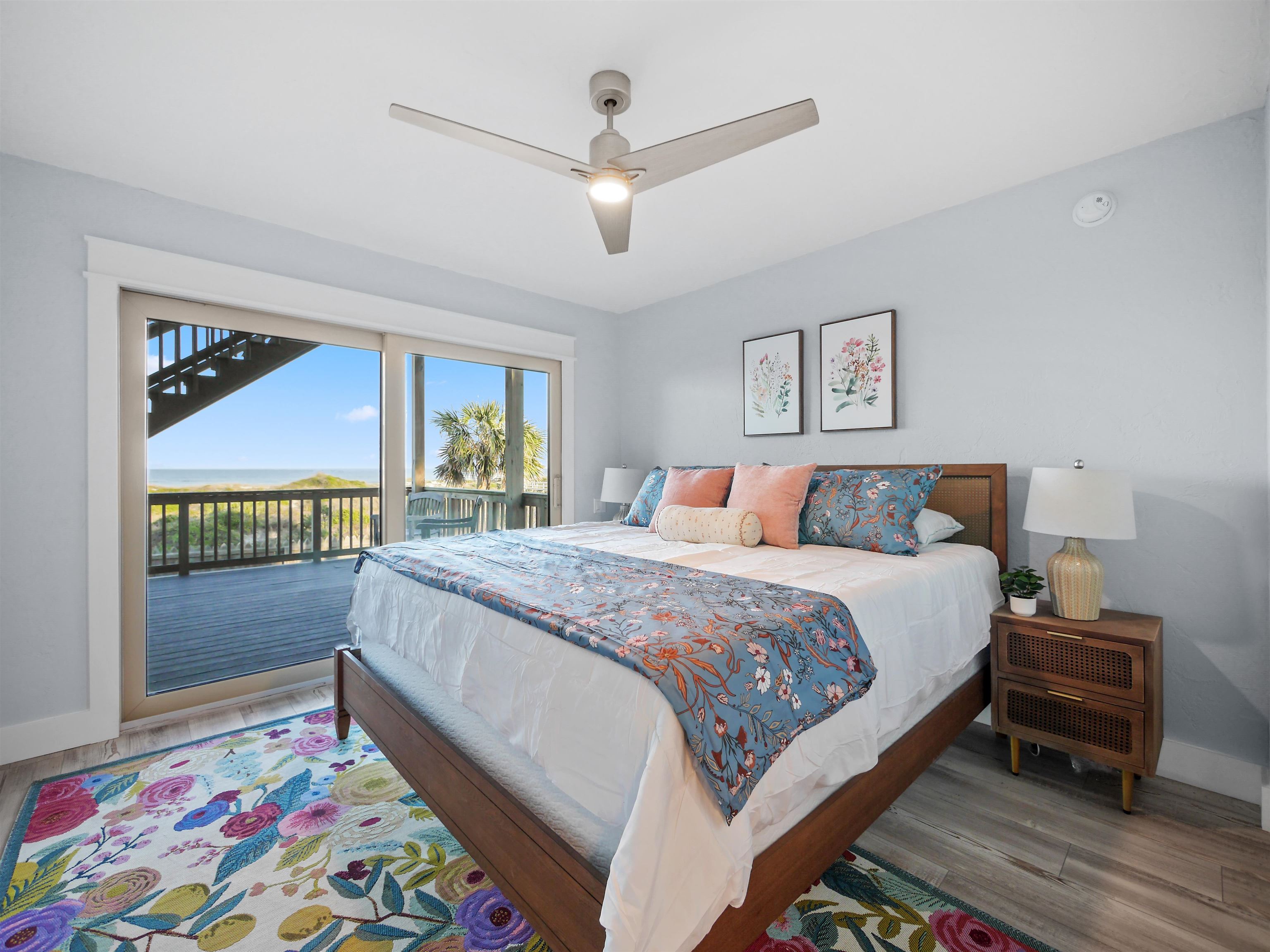 5372 Atlantic View St. Augustine, FL 32080 - Photo 16 of 56 a bedroom with a bed and a painting on the wall