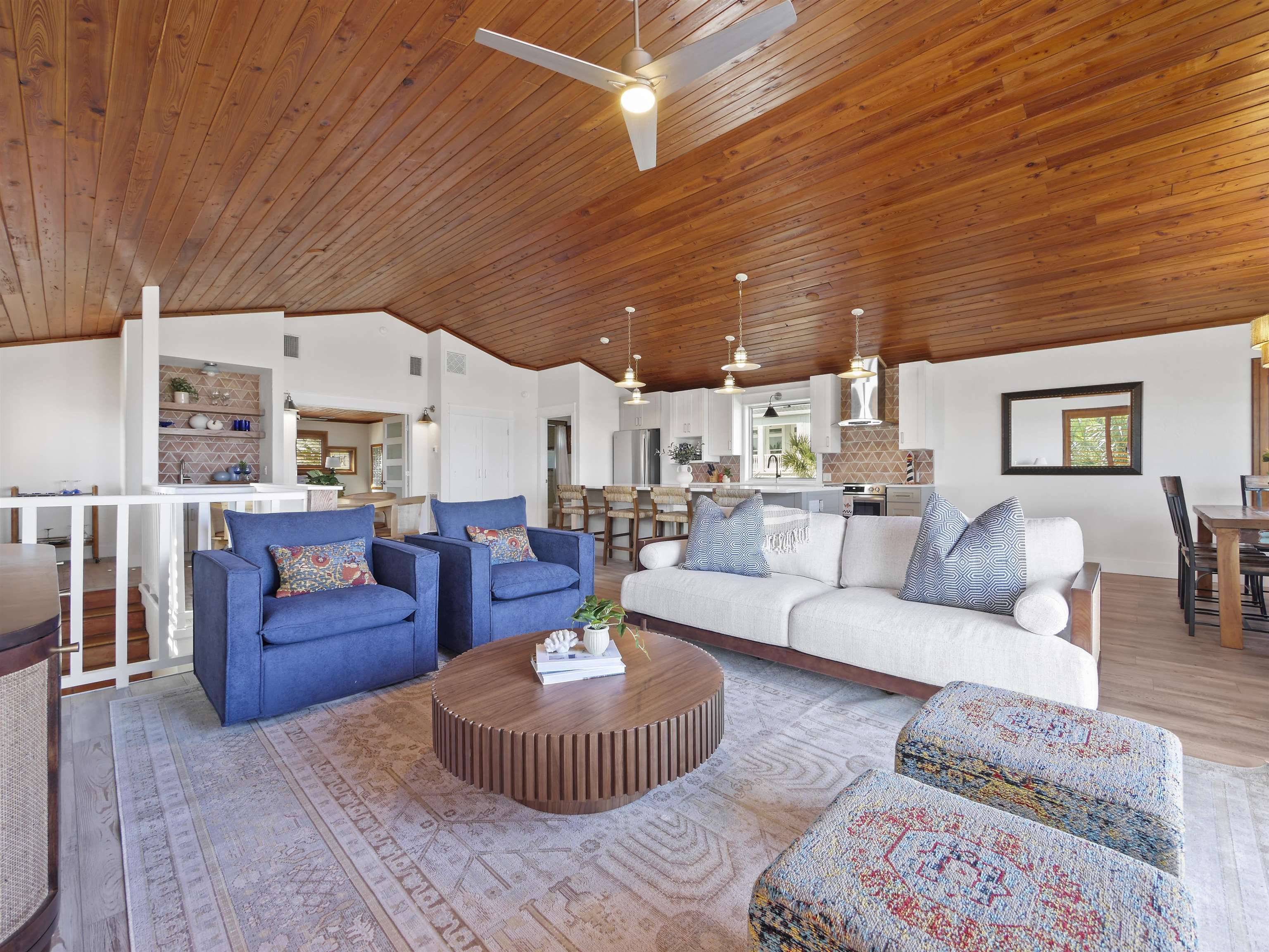 5372 Atlantic View St. Augustine, FL 32080 - Photo 21 of 56 a living room with furniture and a chandelier