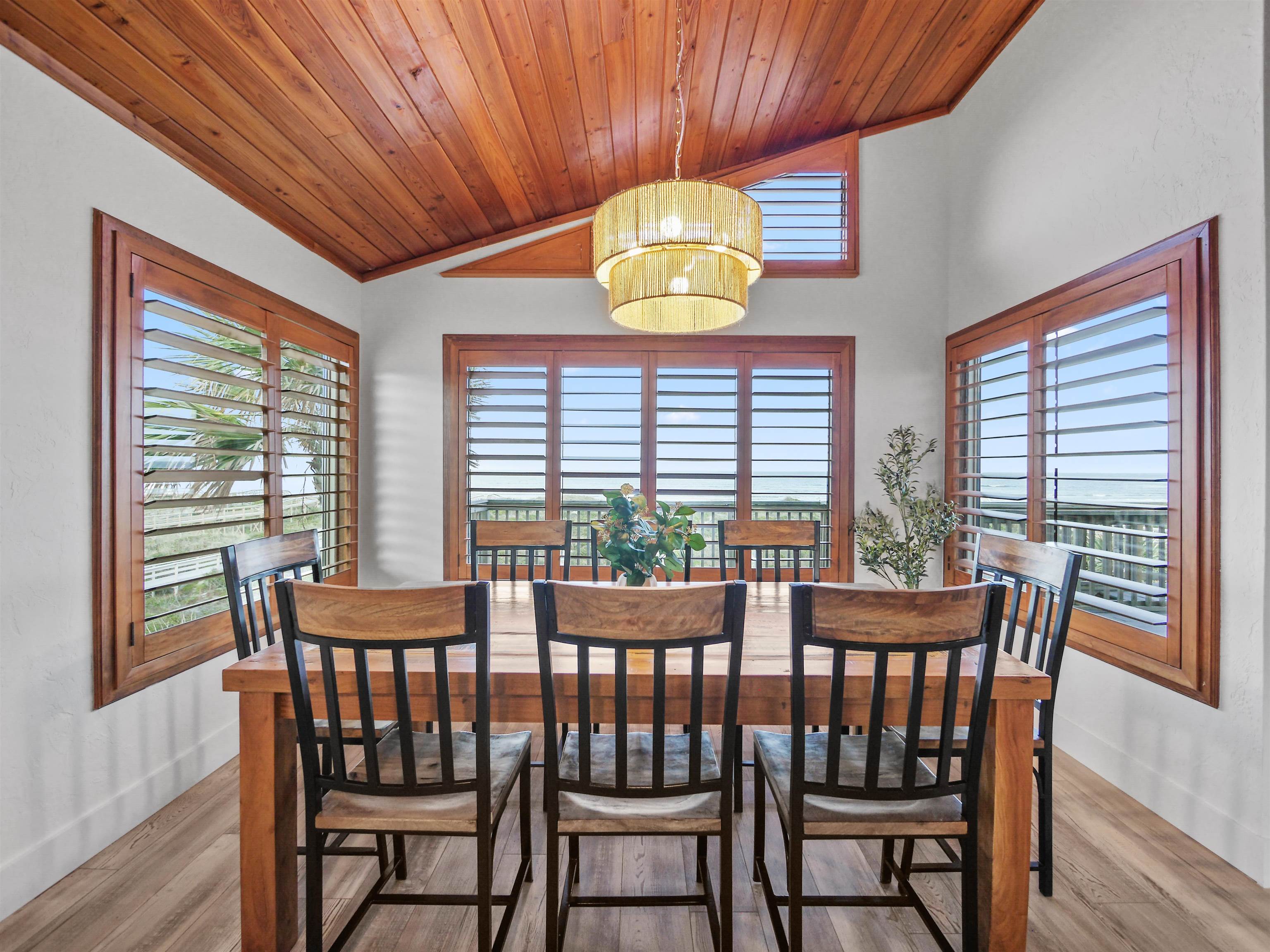 5372 Atlantic View St. Augustine, FL 32080 - Photo 26 of 56 a view of a dining room with furniture window and outside view