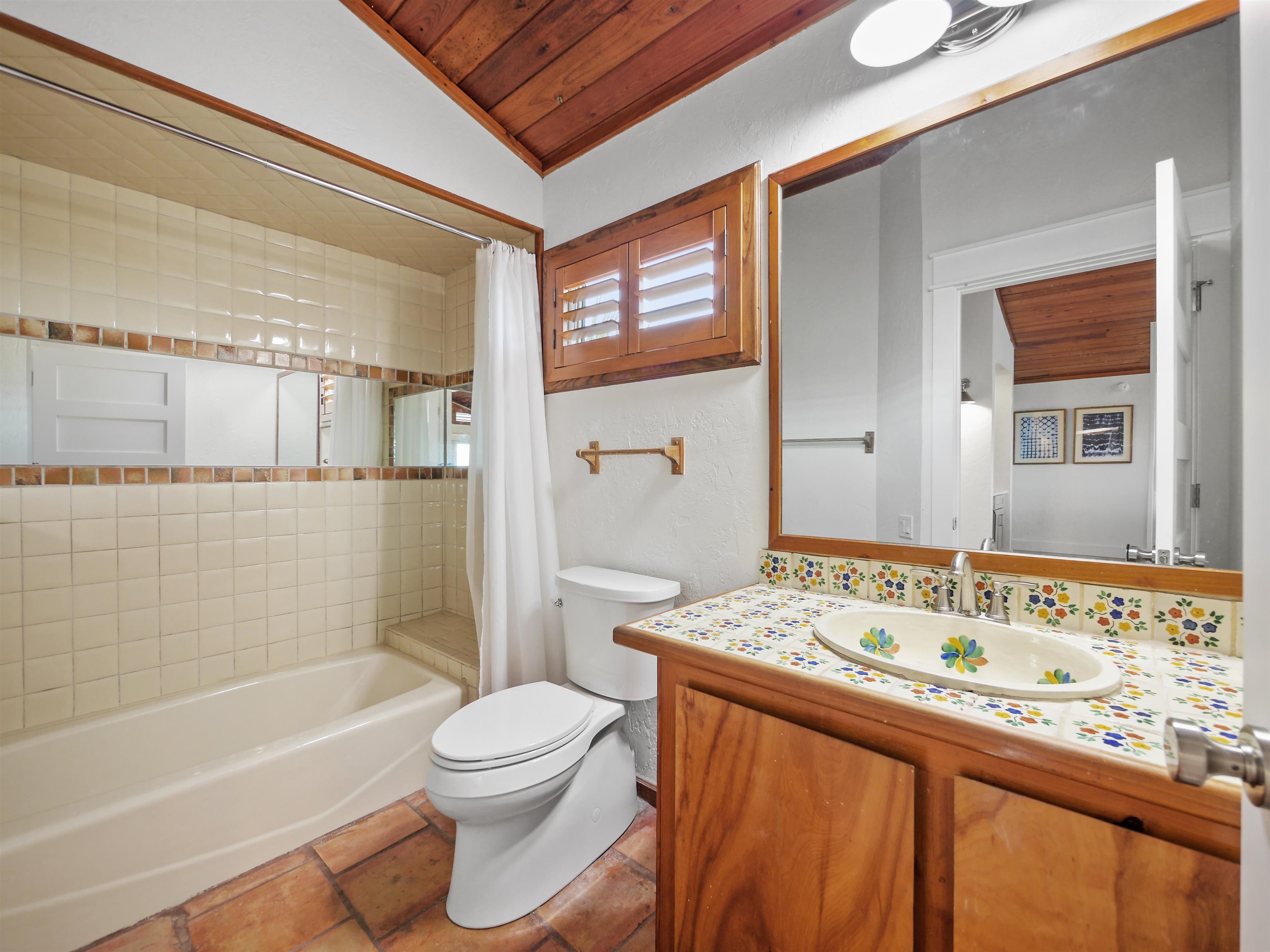 5372 Atlantic View St. Augustine, FL 32080 - Photo 28 of 56 a bathroom with a granite countertop sink toilet and shower