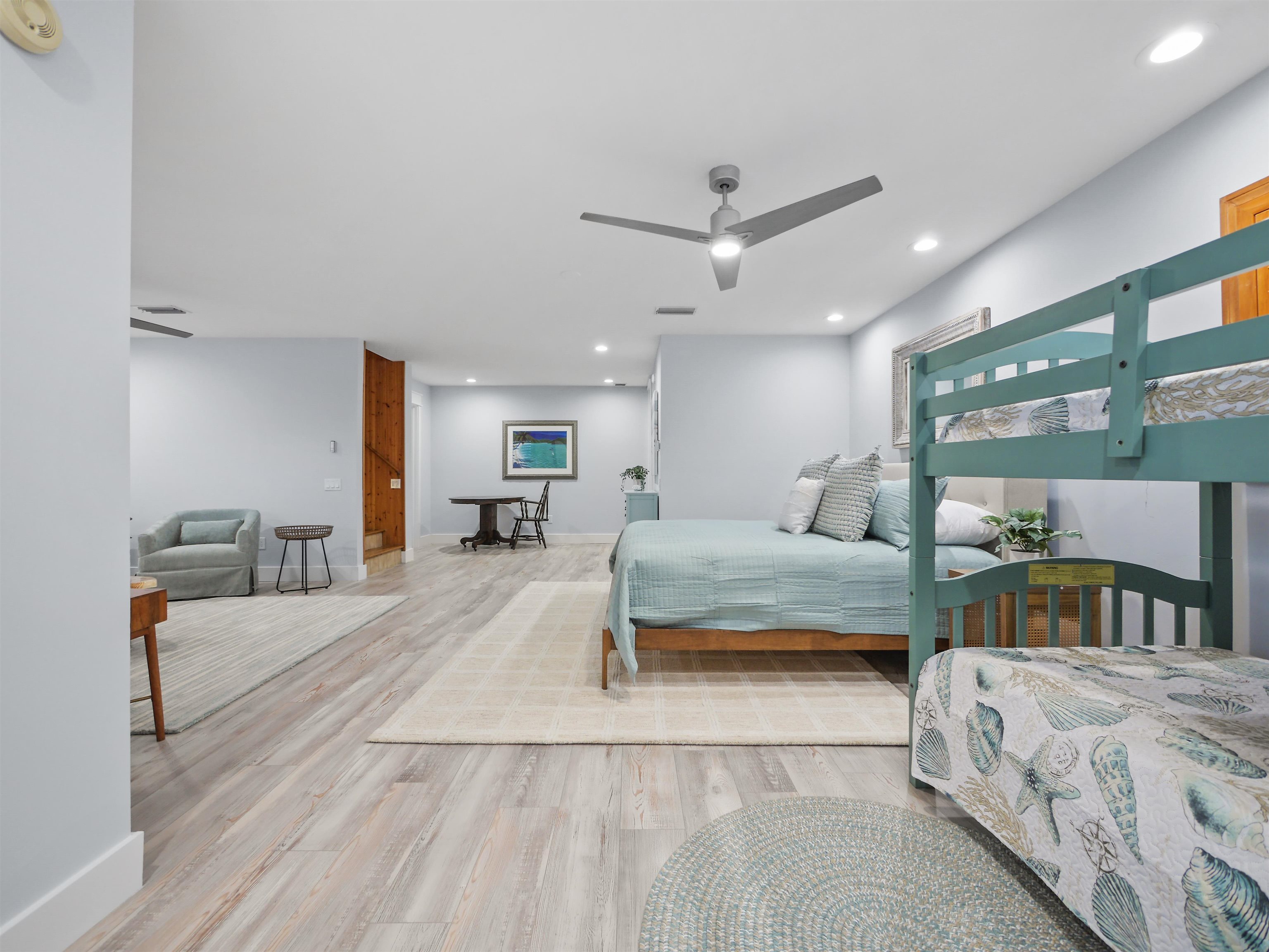 5372 Atlantic View St. Augustine, FL 32080 - Photo 40 of 56 a spacious bedroom with two beds and a large mirror