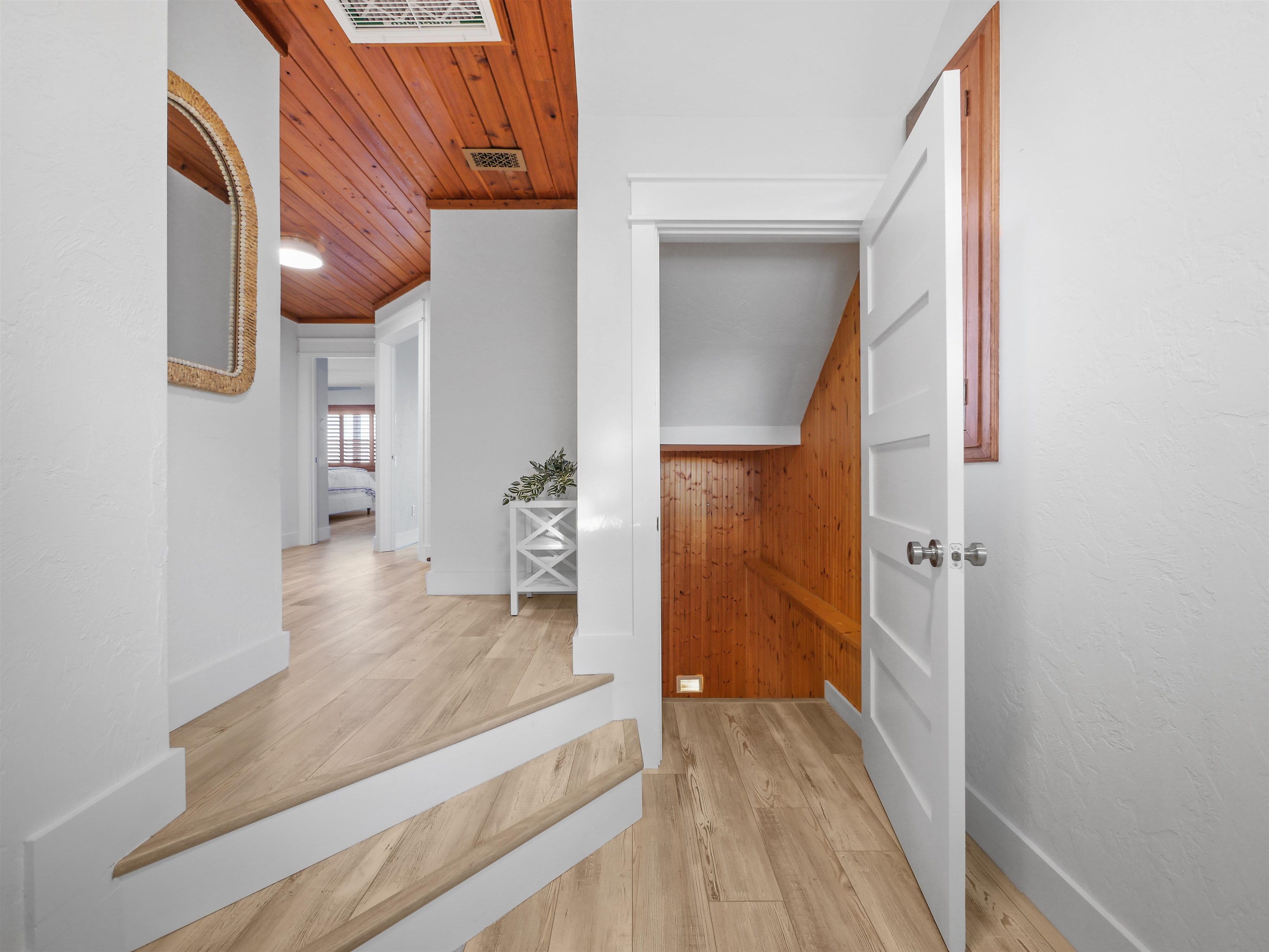 5372 Atlantic View St. Augustine, FL 32080 - Photo 9 of 56 a view of a hallway view with wooden floor and staircase