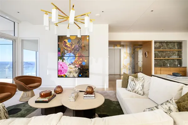 a living room with furniture and a table