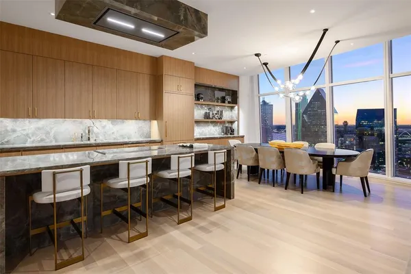 a group of people sitting at tables in a room