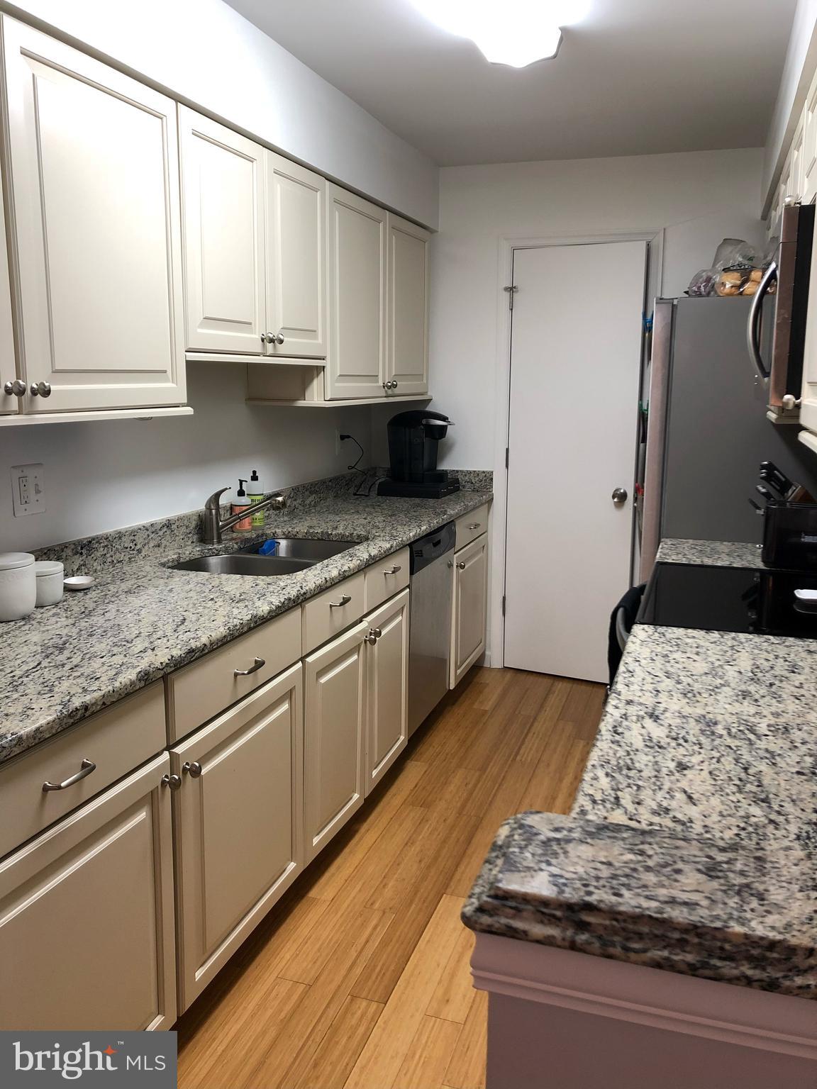 5905 Noblestown Road, Unit F Springfield, VA 22152 - Photo 3 of 29 Updated kitchen, granite, SS appliances, wood flr