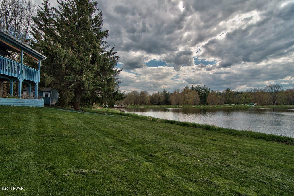 2327 Brookfield Road Lake Ariel, PA 18436 - Photo 40 of 53 a view of a lake with houses in back