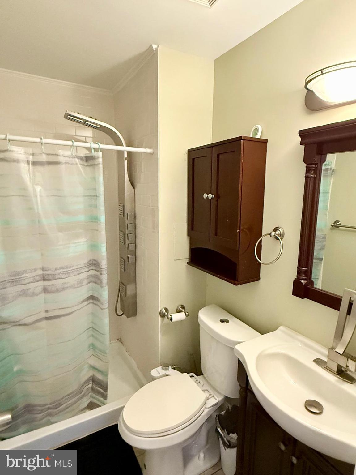 1498 Key Parkway Frederick, MD 21702 - Photo 15 of 28 a bathroom with a sink toilet and shower