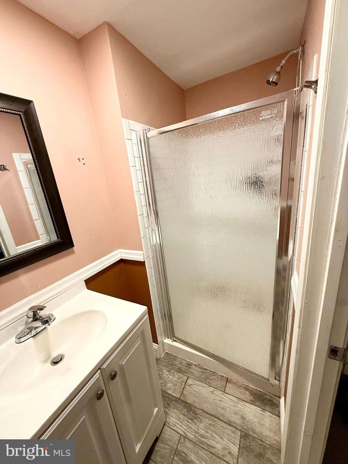 1498 Key Parkway Frederick, MD 21702 - Photo 20 of 28 a bathroom with a sink and a mirror