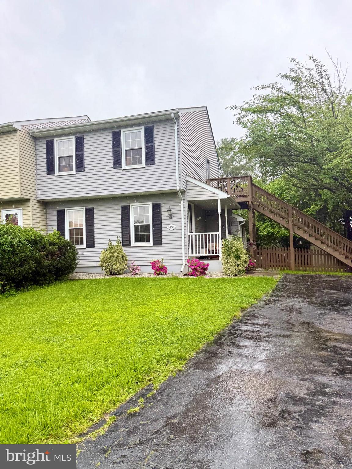 1498 Key Parkway Frederick, MD 21702 - Photo 2 of 28 a front view of a house with a yard and garage