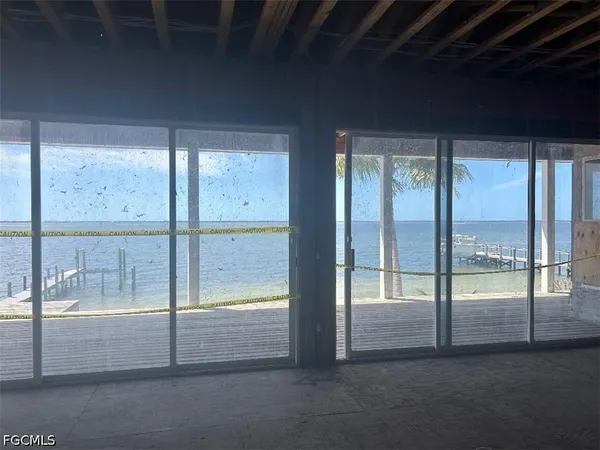 a view of an empty room and window