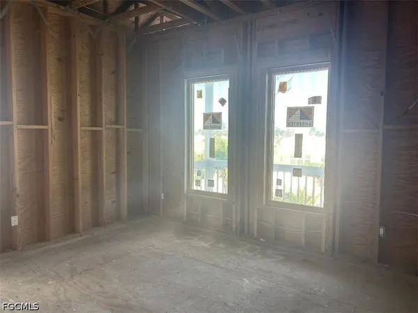 an empty room that has a window